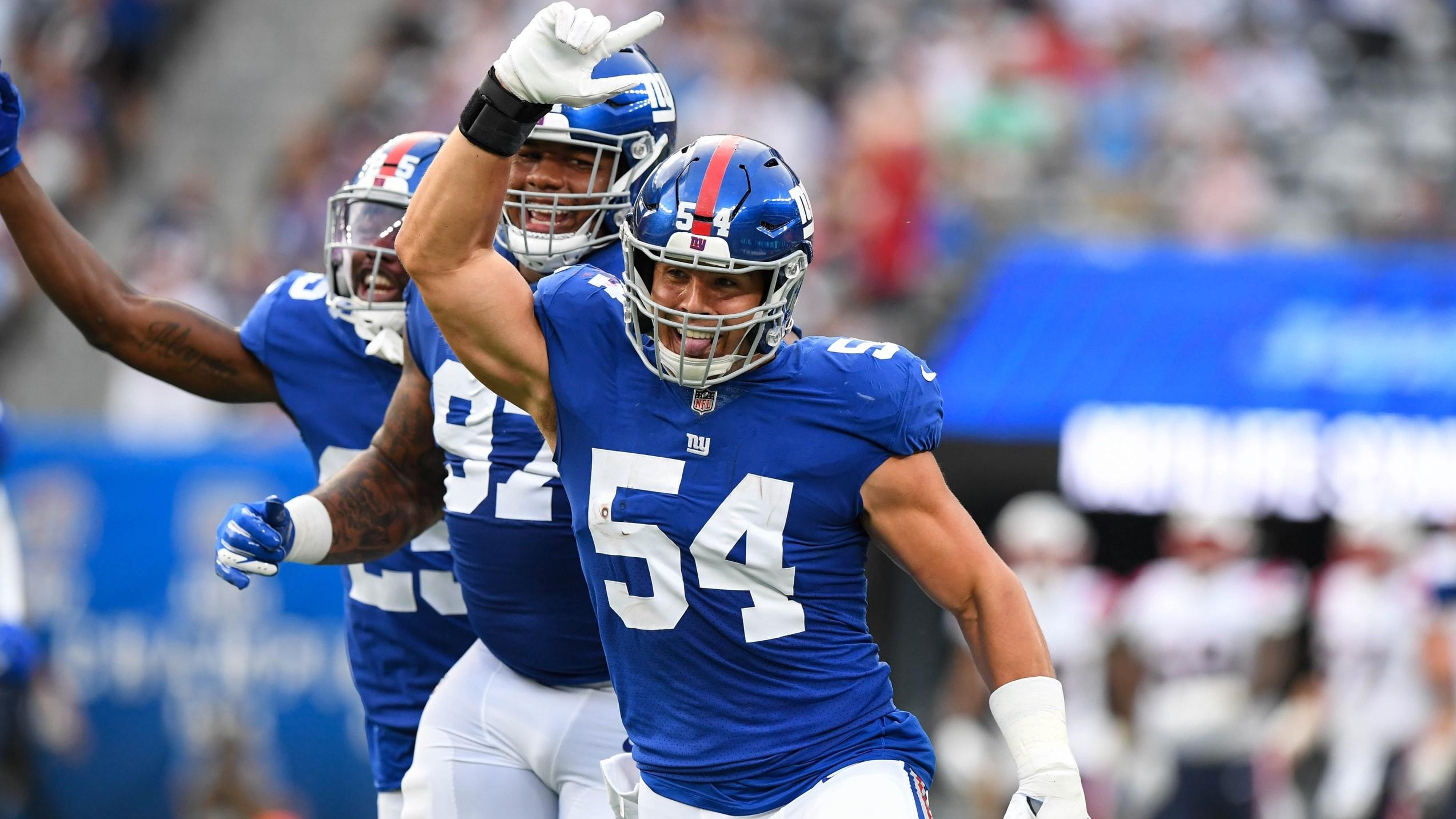 Aug 29, 2021; East Rutherford, New Jersey, USA; New York Giants inside linebacker Blake Martinez (54) celebrate his turnover against the New England Patriots at MetLife Stadium. / Dennis Schneidler-USA TODAY Sports