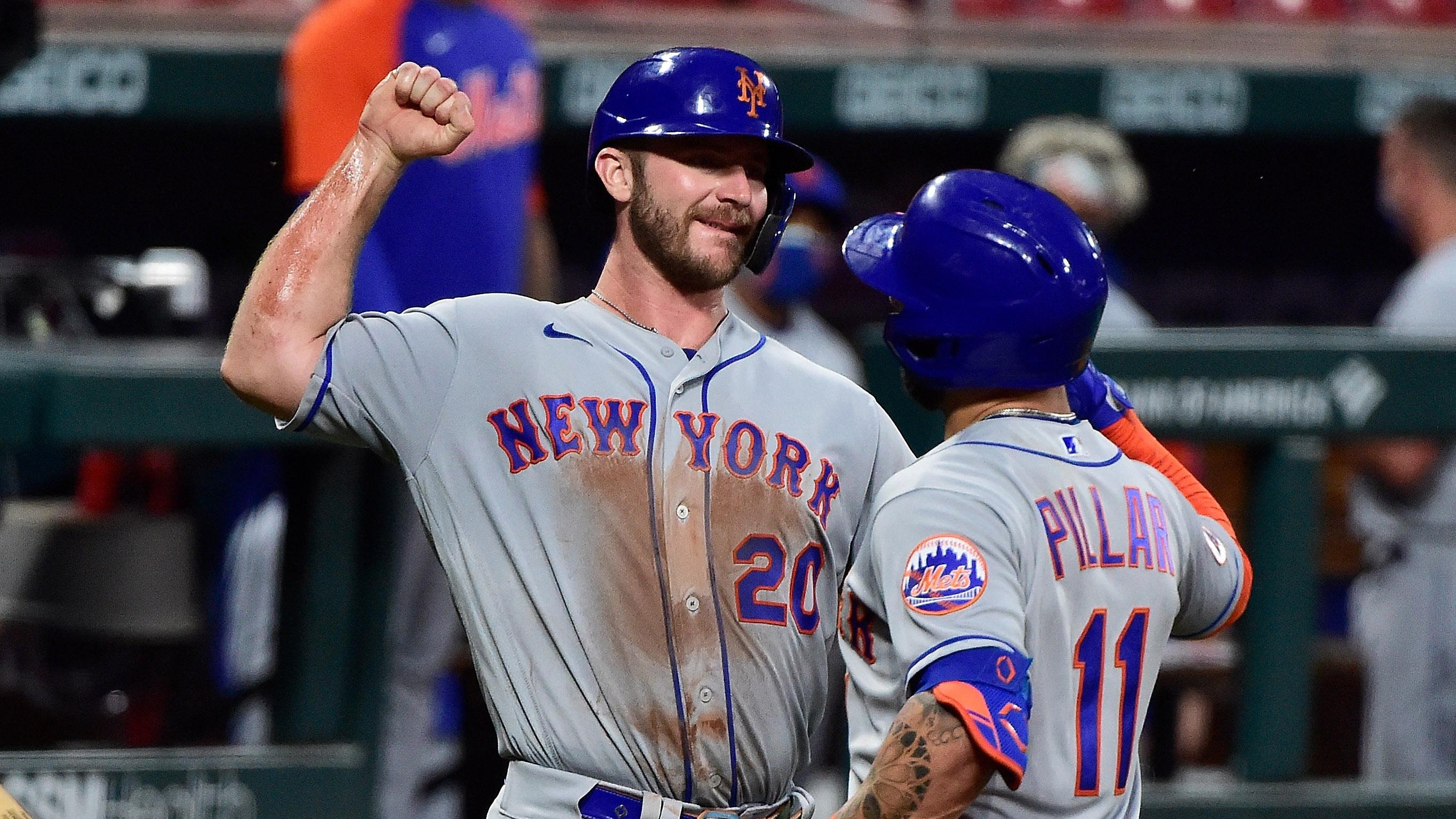 May 3, 2021; St. Louis, Missouri, USA; New York Mets center fielder Kevin Pillar (11) is congratulated by first baseman Pete Alonso (20) after hitting a two run home run during the third inning against the St. Louis Cardinals at Busch Stadium. / Jeff Curry-USA TODAY Sports