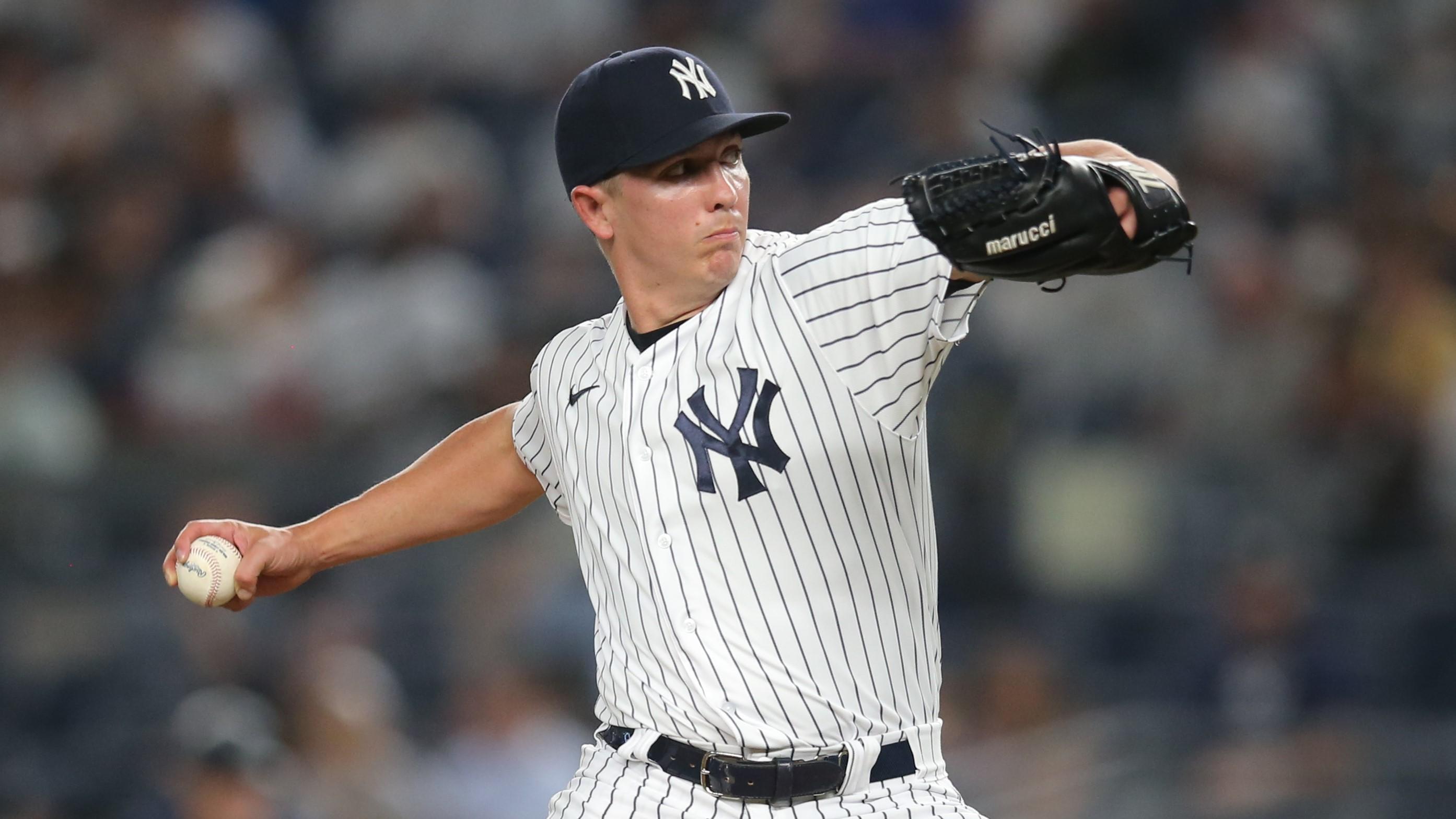 Aug 5, 2021; Bronx, New York, USA; New York Yankees relief pitcher Chad Green (57) throws against the Seattle Mariners during the sixth inning at Yankee Stadium. Mandatory Credit: Brad Penner-USA TODAY Sports / Brad Penner-USA TODAY Sports