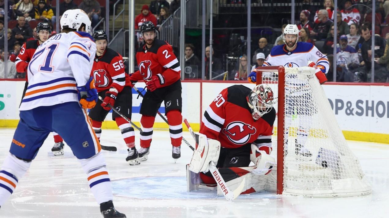 Edmonton Oilers center Ryan McLeod (71) scores a goal on New Jersey Devils goaltender Akira Schmid (40) during the first period. / Ed Mulholland-USA TODAY Sports