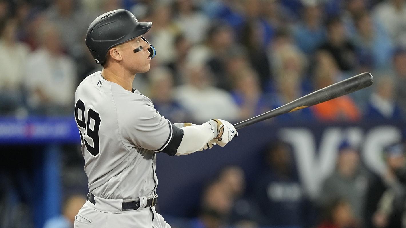 May 16, 2023; Toronto, Ontario, CAN; New York Yankees designated hitter Aaron Judge (99) watches his ball go over the center field wall for a two run home run against the Toronto Blue Jays during the eighth inning at Rogers Centre. / John E. Sokolowski-USA TODAY Sports