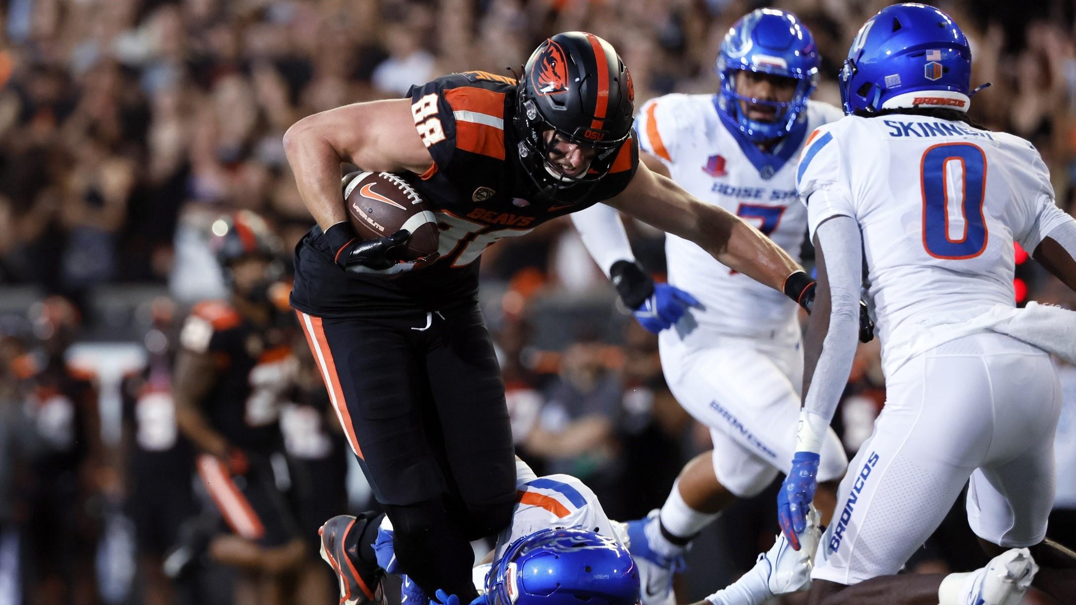 Sep 3, 2022; Corvallis, Oregon, USA; Oregon State Beavers tight end Luke Musgrave (88) is tackled by Boise State Broncos safety Rodney Robinson (4) during the first half at Reser Stadium. / Soobum Im-USA TODAY Sports