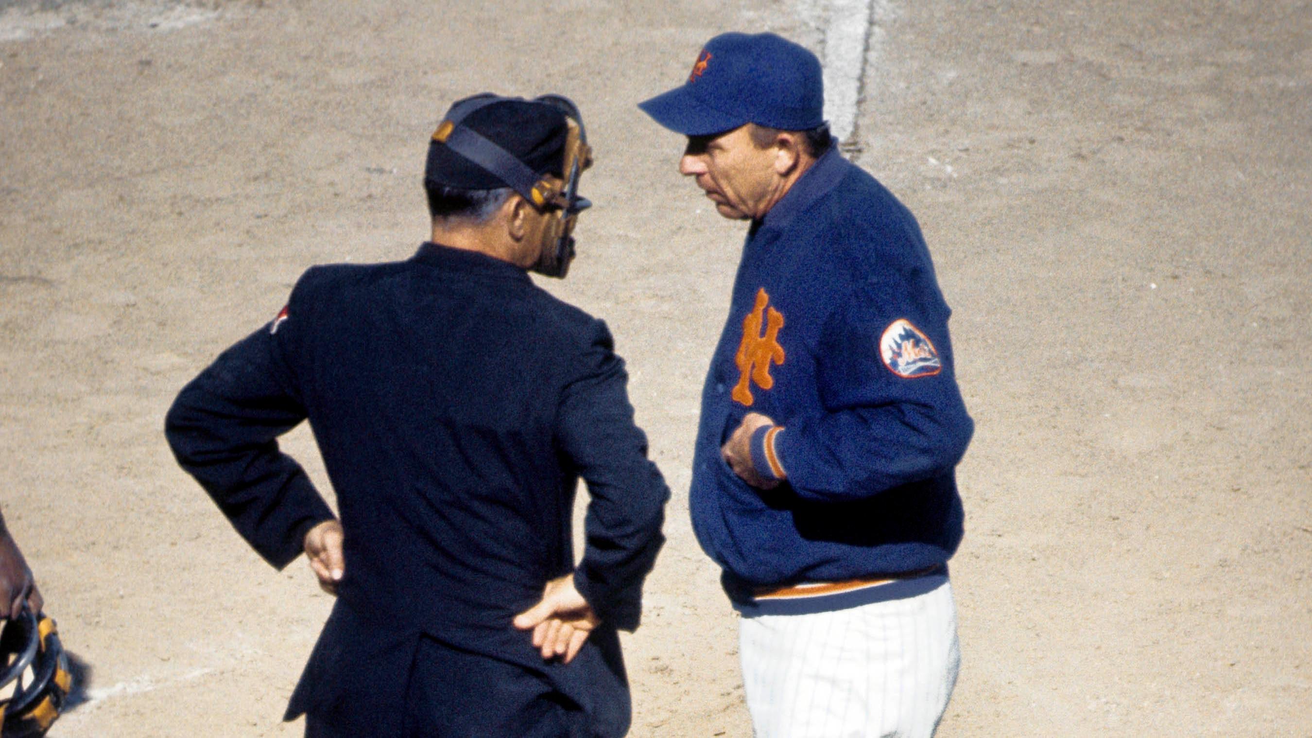 Oct 15, 1969; Flushing, NY, USA; FILE PHOTO; New York Mets manager Gil Hodges (right) talks with NL umpire Shag Crawford (left) against the Baltimore Orioles during game 4 of the 1969 World Series at Shea Stadium. The Mets defeated the Orioles 2-1 in 10 innings. / Dick Raphael-USA TODAY Sports