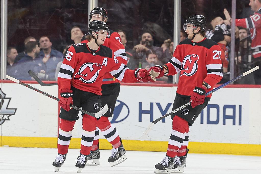 New Jersey Devils center Jack Hughes (86) celebrates his goal with center Michael McLeod (20) during the first period against the Columbus Blue Jackets at Prudential Center. / Vincent Carchietta-USA TODAY Sports