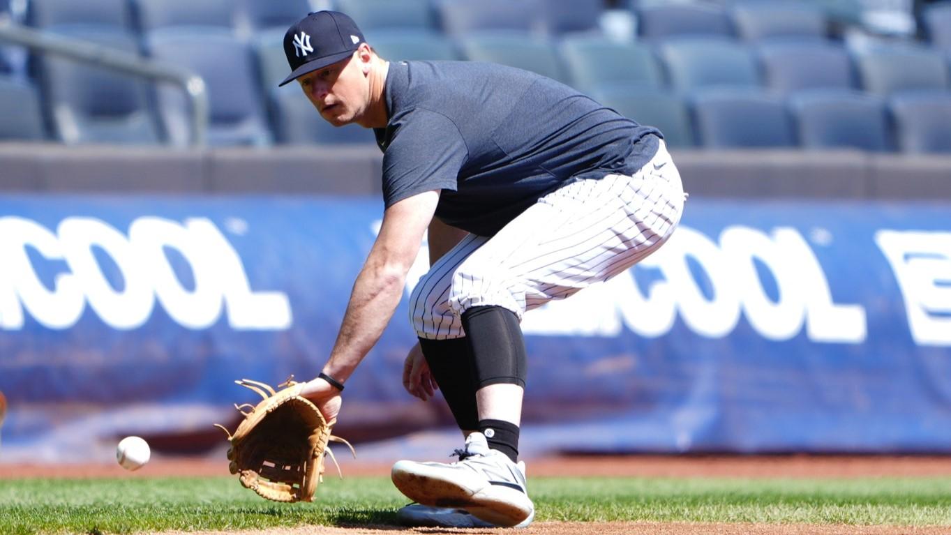 Apr 22, 2024; Bronx, New York, USA; New York Yankees third baseman DJ LeMahieu (26) takes infield practice before a game against the Oakland Athletics at Yankee Stadium. / Gregory Fisher-USA TODAY Sports