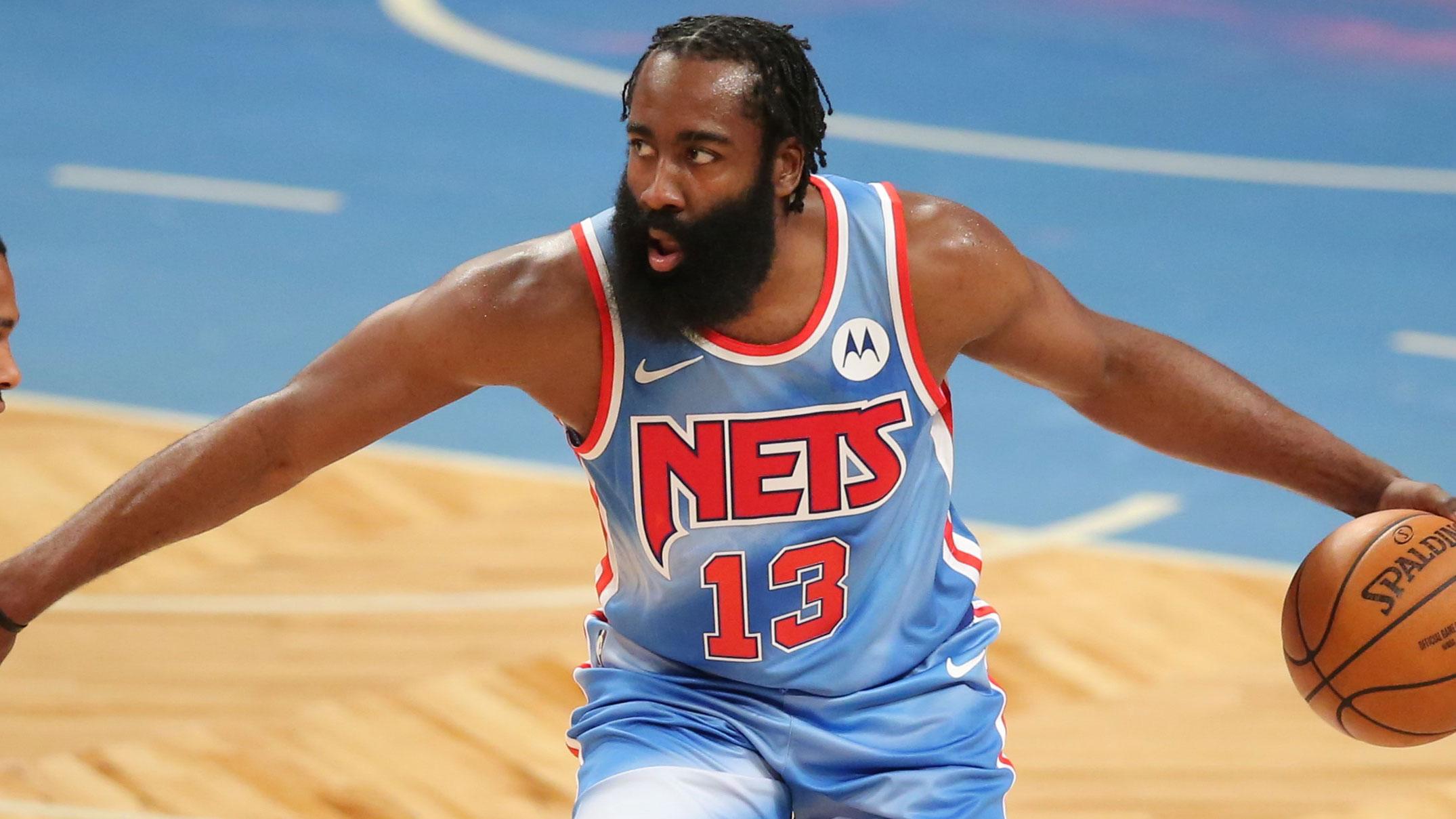 Mar 31, 2021; Brooklyn, New York, USA; Brooklyn Nets shooting guard James Harden (13) dribbles the ball while defended by Houston Rockets power forward D.J. Wilson (0) during the first quarter at Barclays Center. / Brad Penner-USA TODAY Sports