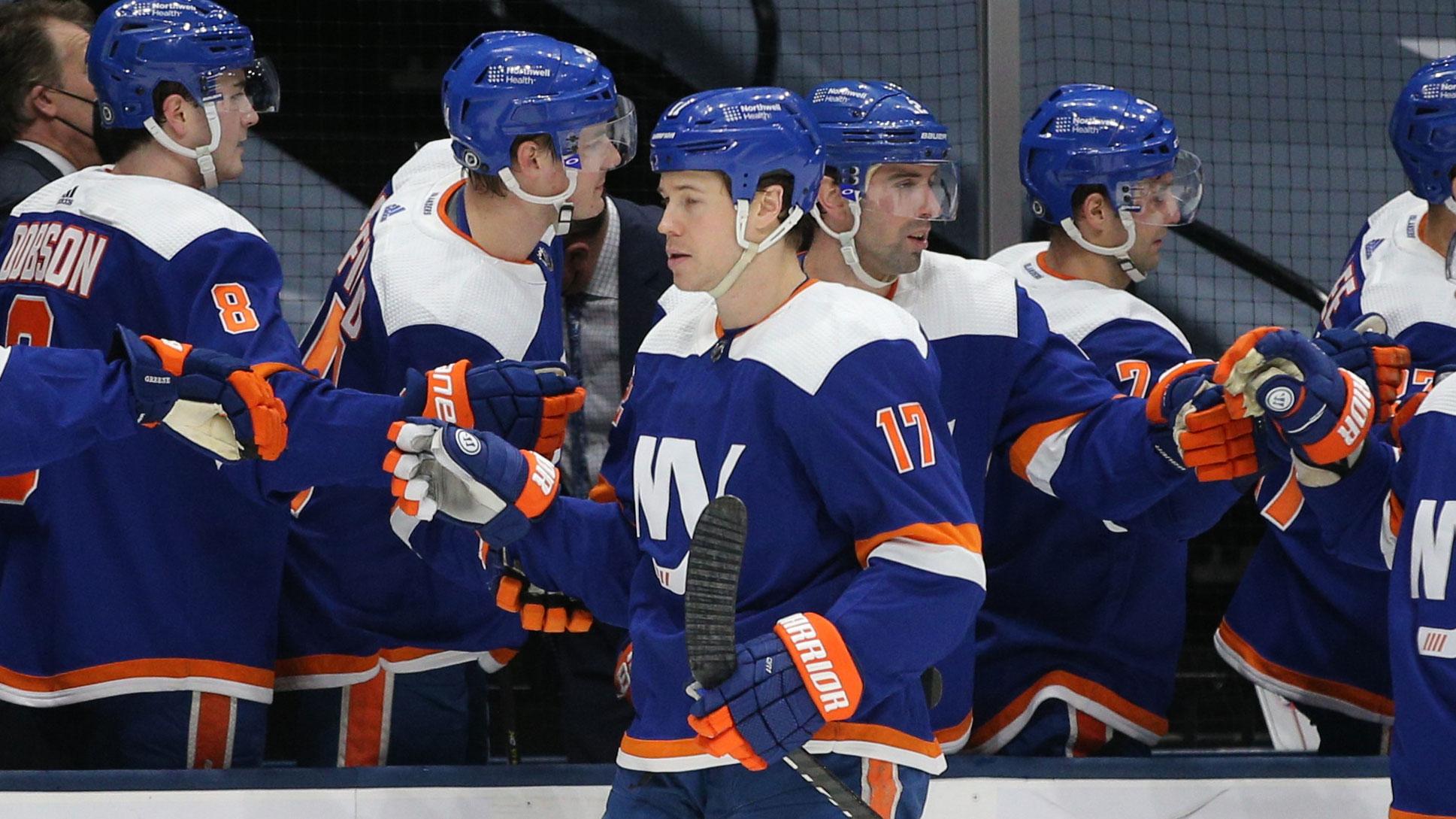 Mar 4, 2021; Uniondale, New York, USA; New York Islanders left wing Matt Martin (17) celebrates his goal against the Buffalo Sabres with teammates during the first period at Nassau Veterans Memorial Coliseum. / Brad Penner-USA TODAY Sports