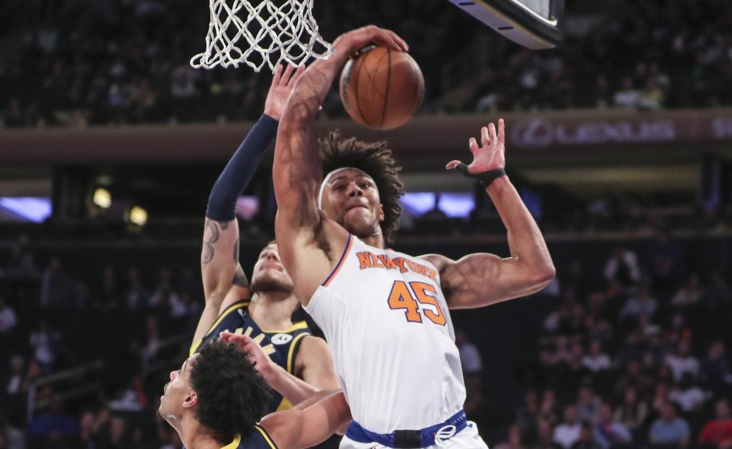 New York Knicks forward Jericho Sims (45) grabs a rebound in the fourth quarter against the Indiana Pacers at Madison Square Garden. / Wendell Cruz-USA TODAY Sports