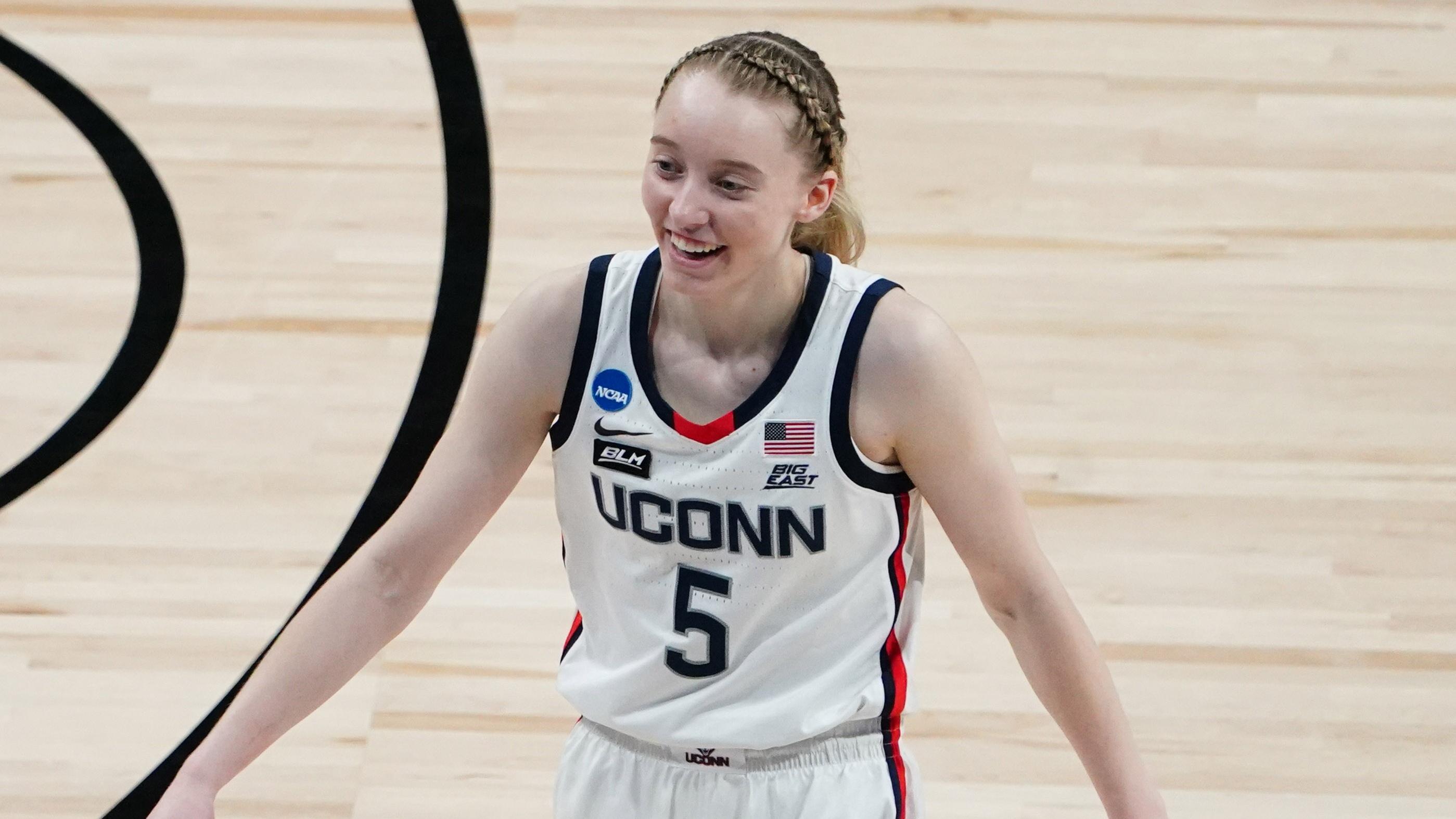 Mar 27, 2021; San Antonio, Texas, USA; Connecticut Huskies guard Paige Bueckers (5) celebrates against the Iowa Hawkeyes in the Sweet Sixteen of the 2021 Women's NCAA Tournament at Alamodome / © Kirby Lee-USA TODAY Sports