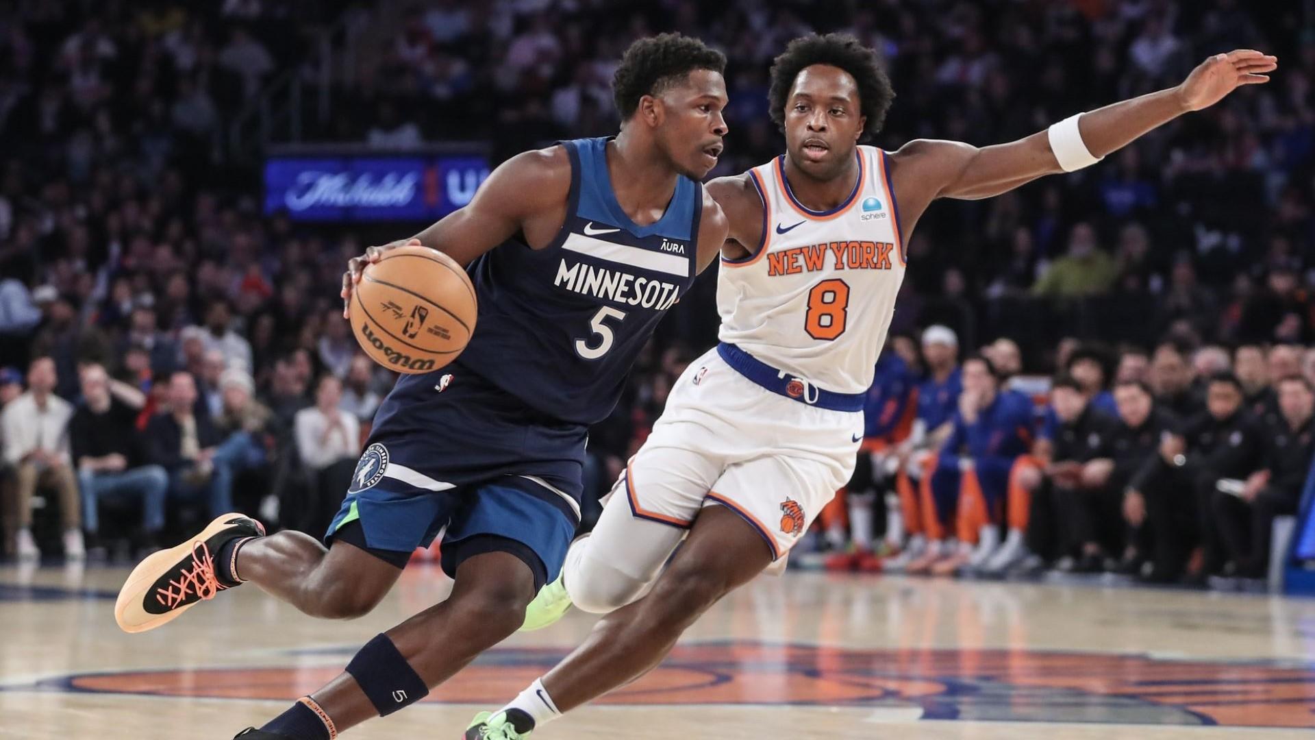 Jan 1, 2024; New York, New York, USA; Minnesota Timberwolves guard Anthony Edwards (5) looks to drive past New York Knicks forward OG Anunoby (8) in the first quarter at Madison Square Garden. / Wendell Cruz-USA TODAY Sports
