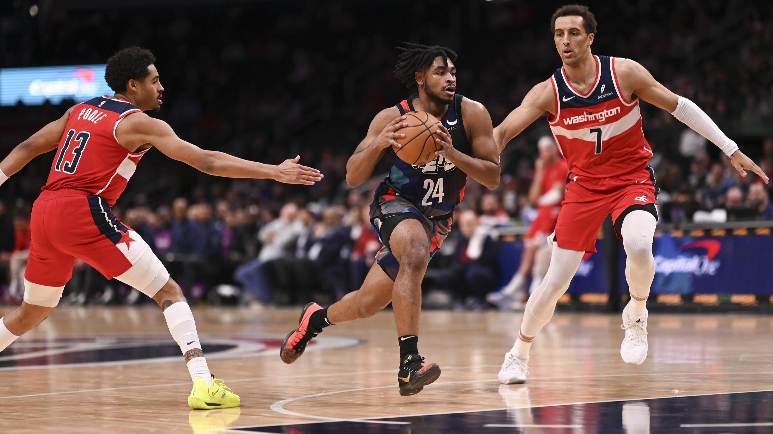 Mar 27, 2024; Washington, District of Columbia, USA; Brooklyn Nets guard Cam Thomas (24) makes a move to the basket on Washington Wizards forward Patrick Baldwin Jr. (7) during the first half at Capital One Arena. / Tommy Gilligan-USA TODAY Sports