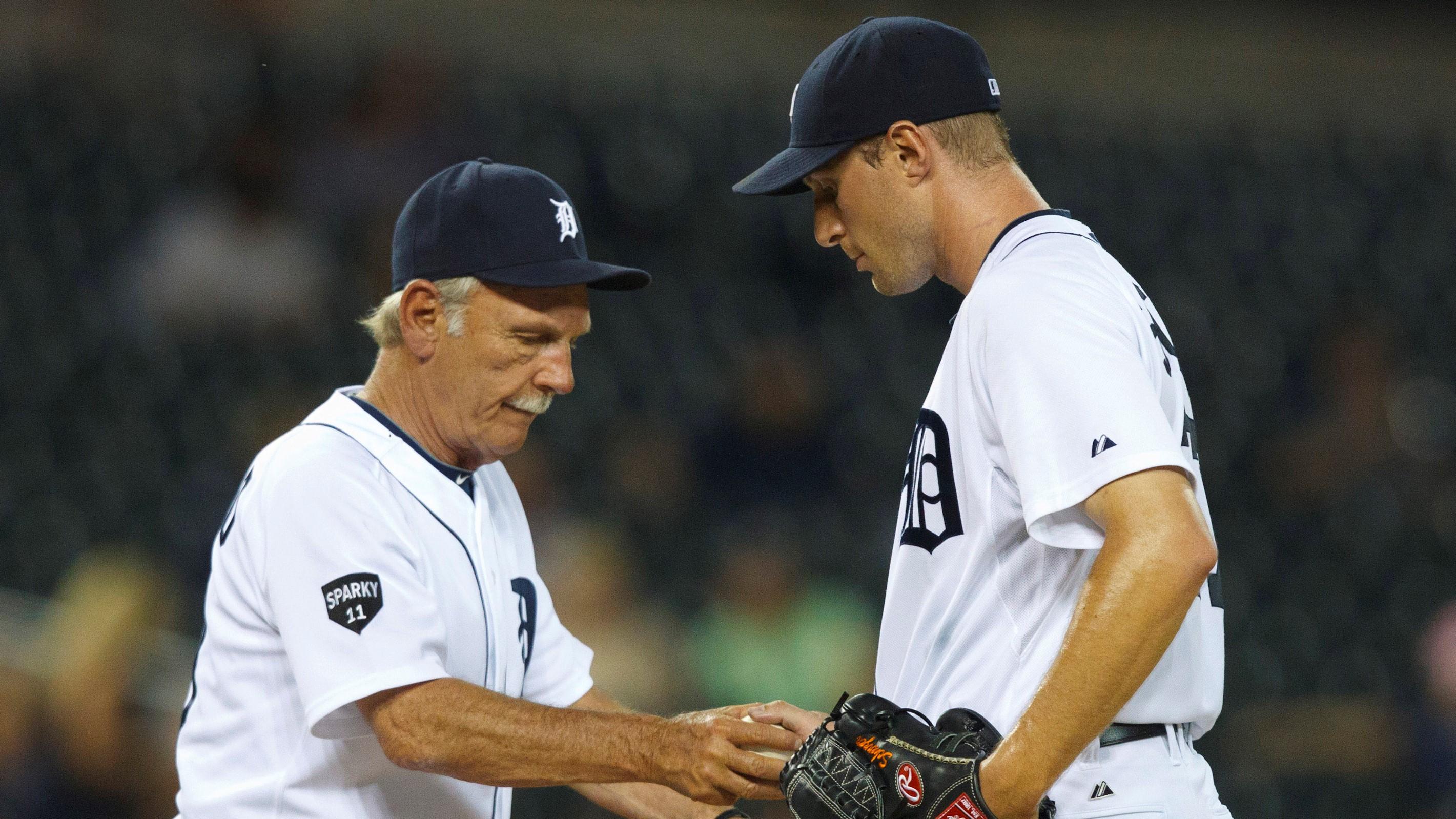 May 31, 2011; Detroit, MI, USA; Detroit Tigers manager Jim Leyland (left) takes the ball from starting pitcher Max Scherzer (right) during the seventh inning against the Minnesota Twins at Comerica Park. / Rick Osentoski-USA TODAY Sports
