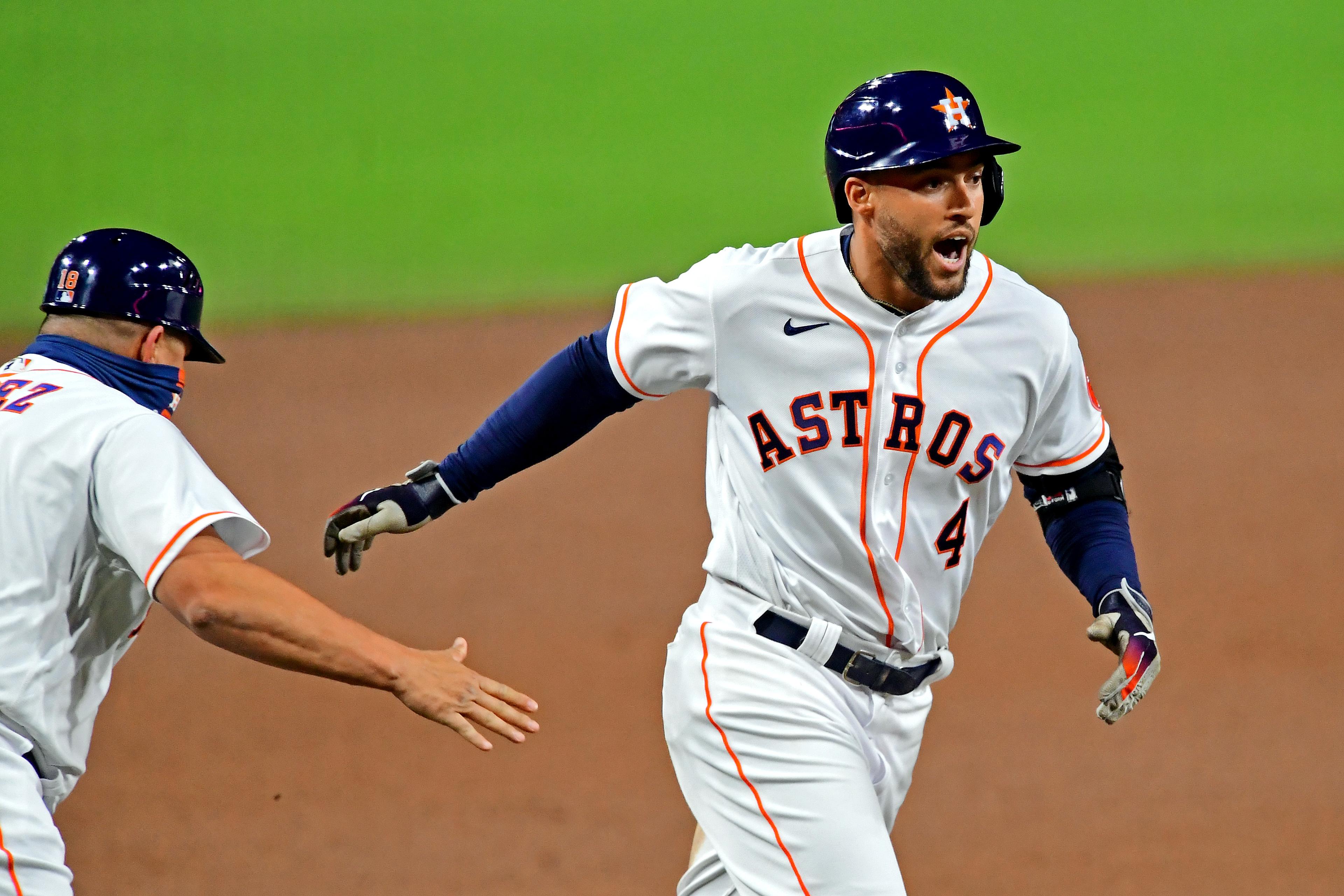 Oct 14, 2020; San Diego, California, USA; Houston Astros center fielder George Springer (4) celebrates hitting a two run home run during the fifth inning against the Tampa Bay Rays during game four of the 2020 ALCS at Petco Park. / Jayne Kamin-Oncea-USA TODAY Sports