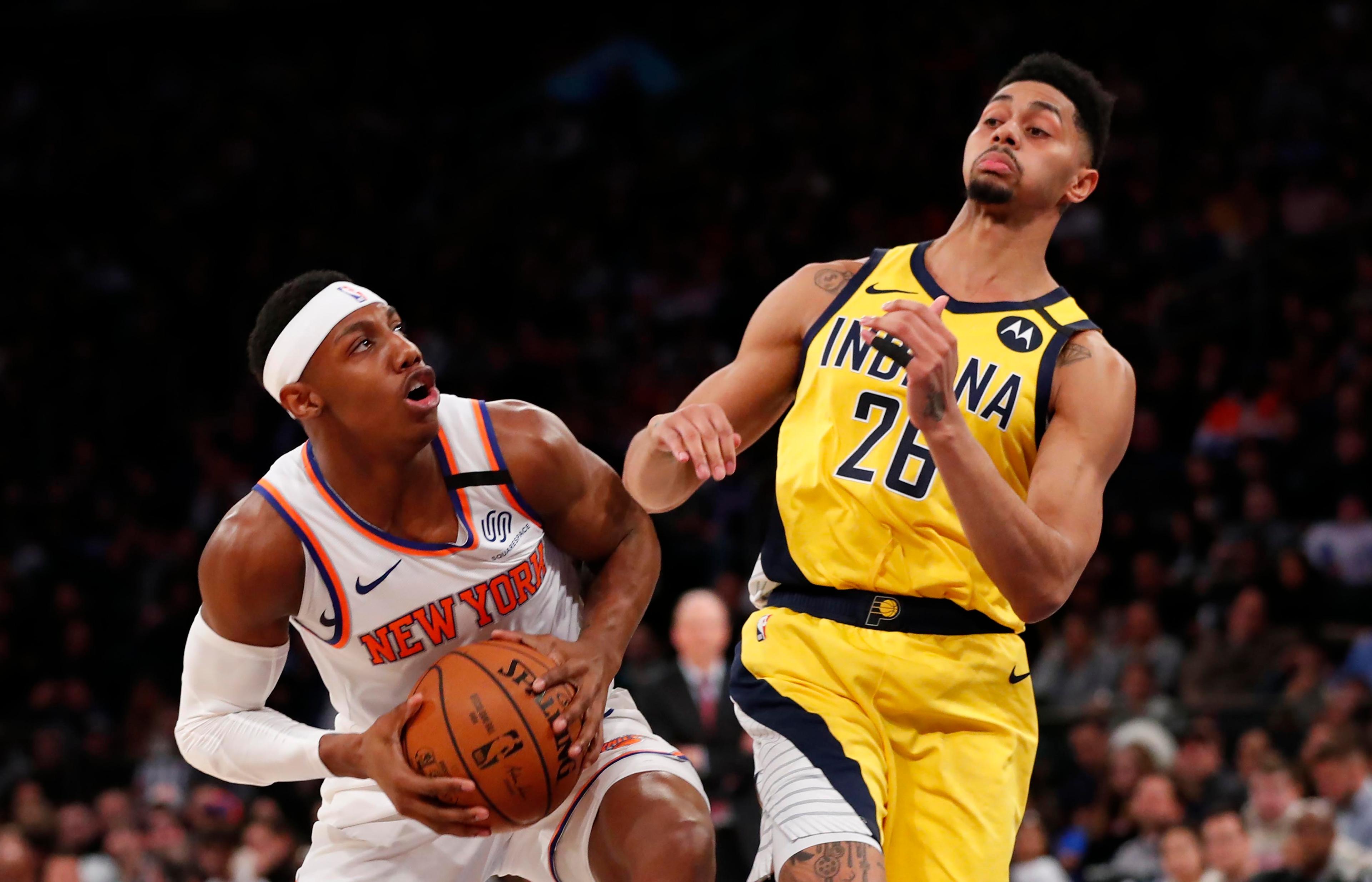 RJ Barrett goes against Pacers' Jeremy Lamb / USA TODAY