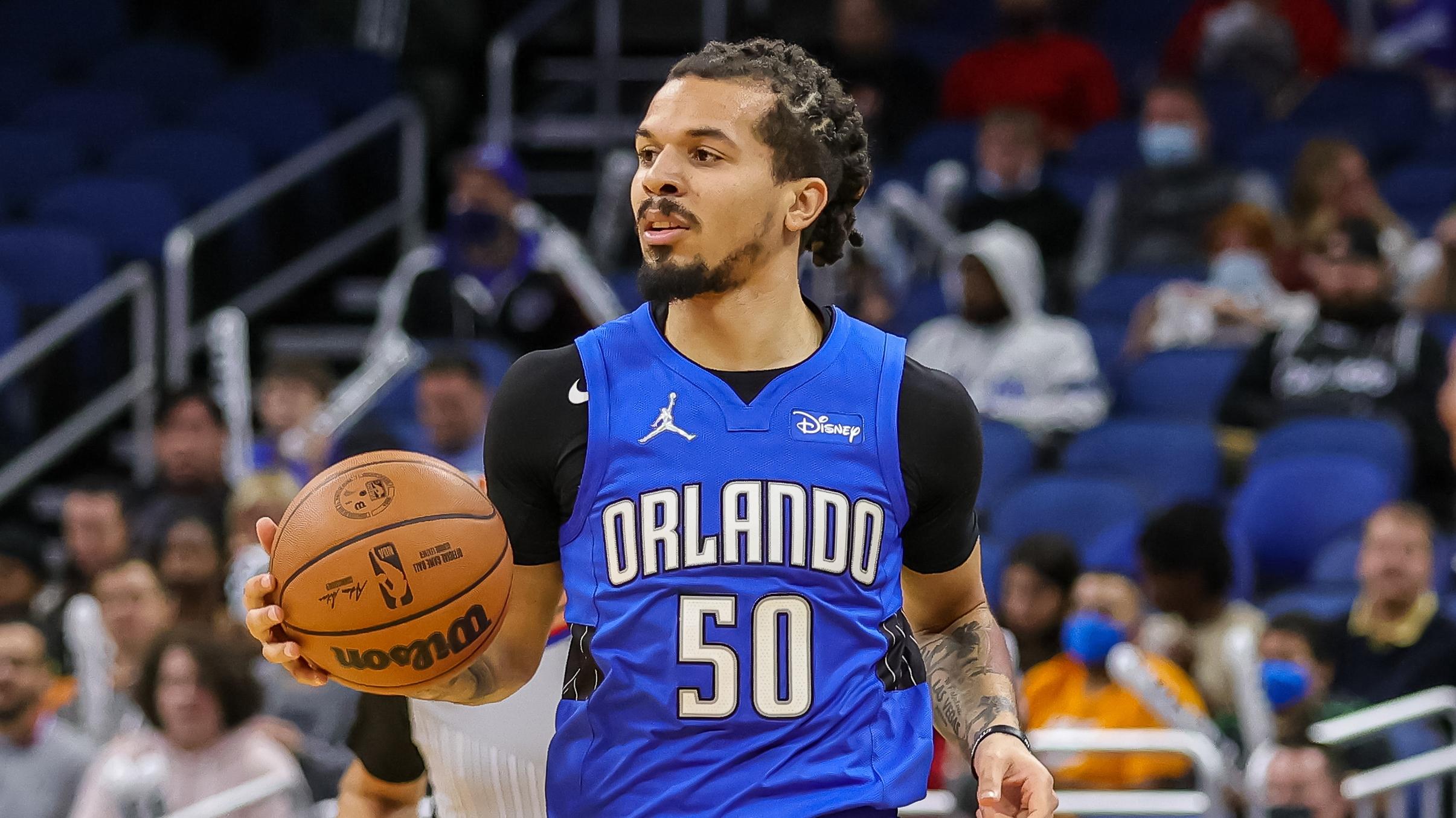 Dec 23, 2021; Orlando, Florida, USA; Orlando Magic guard Cole Anthony (50) brings the ball up court during the first quarter against the New Orleans Pelicans at Amway Center. / Mike Watters-USA TODAY Sports