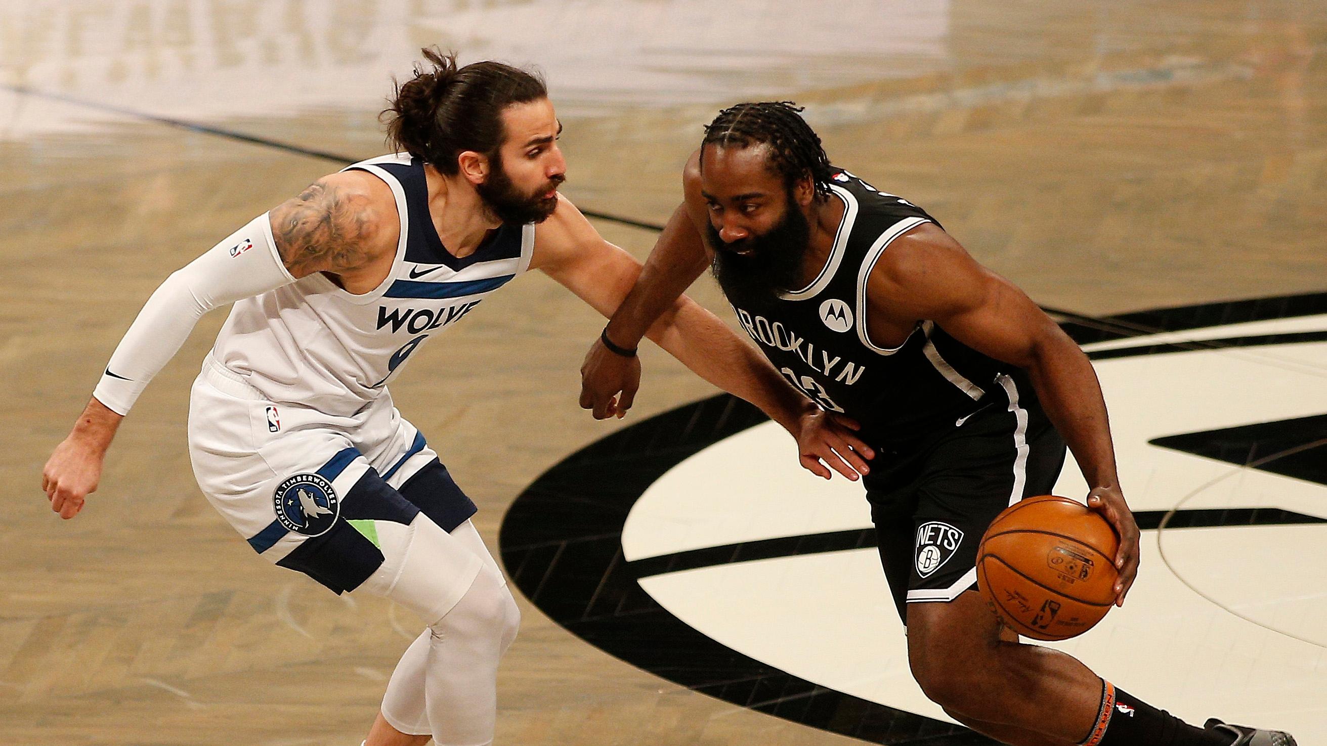 Brooklyn Nets guard James Harden (13) dribbles the ball against Minnesota Timberwolves guard Ricky Rubio (9) during the first half at Barclays Center. / Andy Marlin-USA TODAY Sports