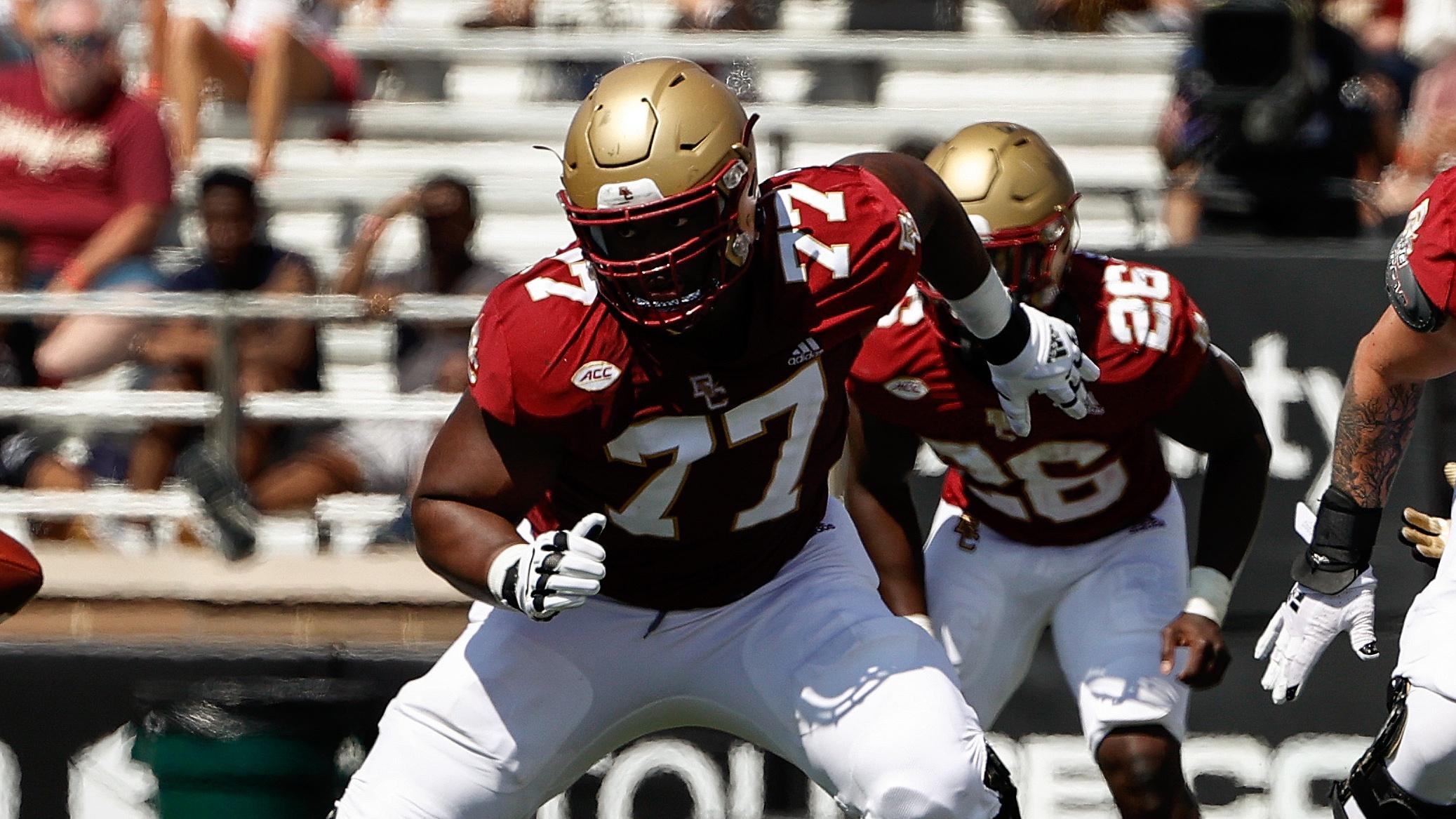 Sep 4, 2021; Chestnut Hill, Massachusetts, USA; Boston College Eagles offensive lineman Zion Johnson (77) looks to block against the Colgate Raiders during the first half at Alumni Stadium. Mandatory Credit: Winslow Townson-USA TODAY Sports / © Winslow Townson-USA TODAY Sports