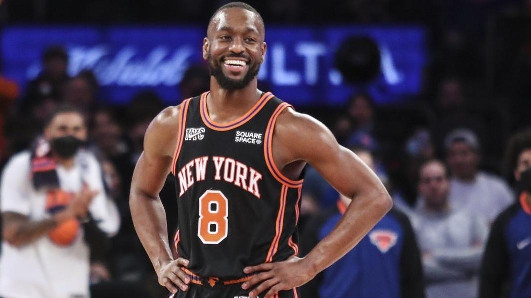 Dec 25, 2021; New York, New York, USA; New York Knicks guard Kemba Walker (8) reacts to the crowd chanting his name in the fourth quarter after he recorded a triple double against the Atlanta Hawks at Madison Square Garden. / Wendell Cruz-USA TODAY Sports