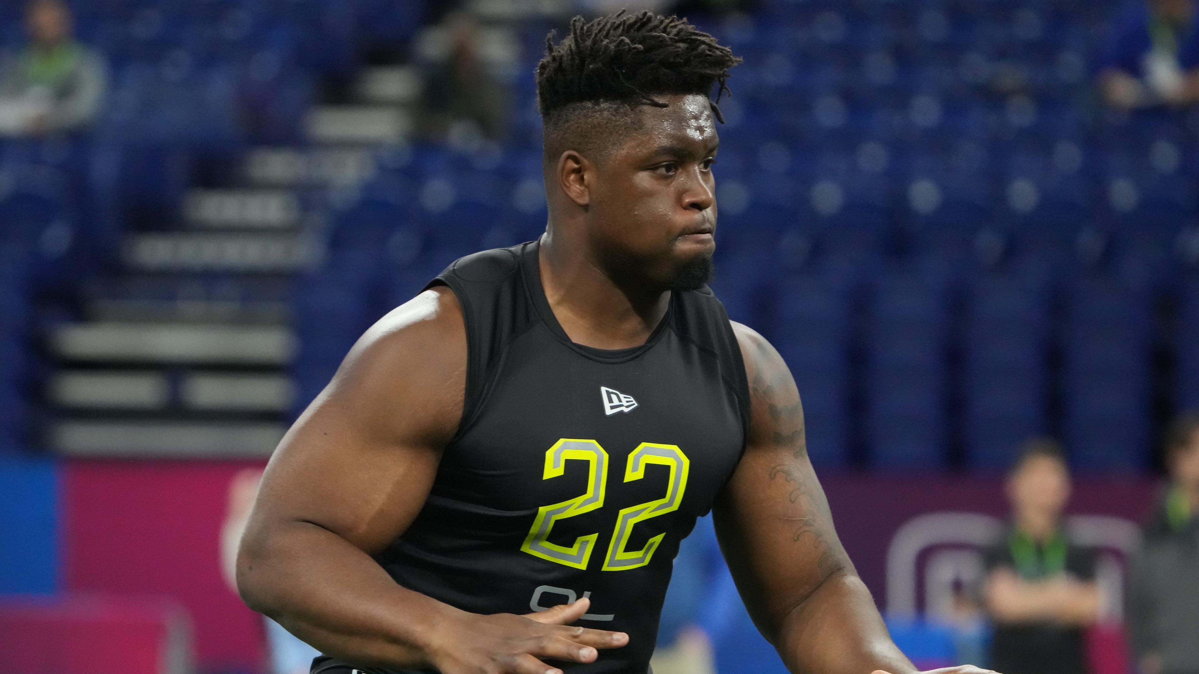 Boston col offensive lineman Zion Johnson (OL22) goes through drills during the 2022 NFL Scouting Combine at Lucas Oil Stadium. / Kirby Lee-USA TODAY Sports