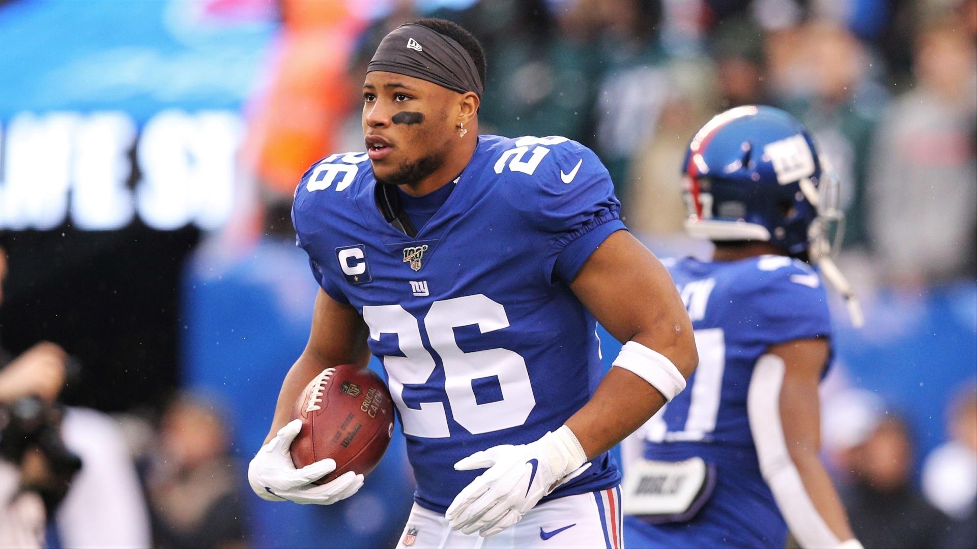 Dec 29, 2019; East Rutherford, New Jersey, USA; New York Giants running back Saquon Barkley (26) warms up before a game against the Philadelphia Eagles at MetLife Stadium. / Brad Penner-USA TODAY Sports