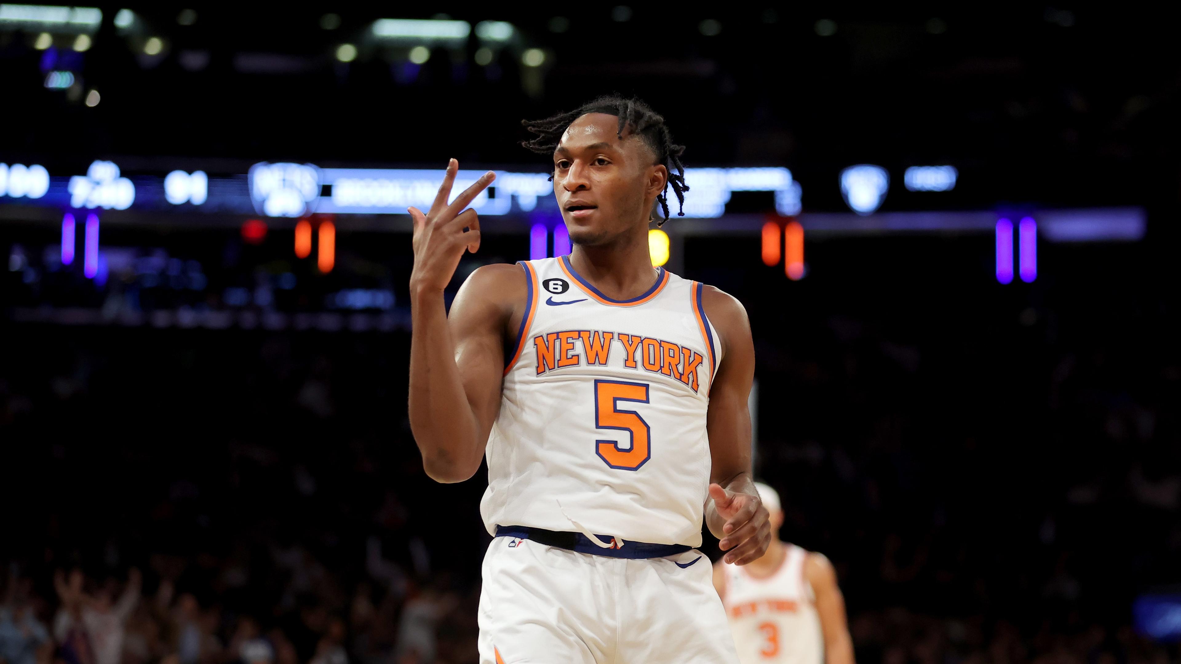 Feb 13, 2023; New York, New York, USA; New York Knicks guard Immanuel Quickley (5) reacts after a three point shot against the Brooklyn Nets during the fourth quarter at Madison Square Garden. Mandatory Credit: Brad Penner-USA TODAY Sports / © Brad Penner-USA TODAY Sports