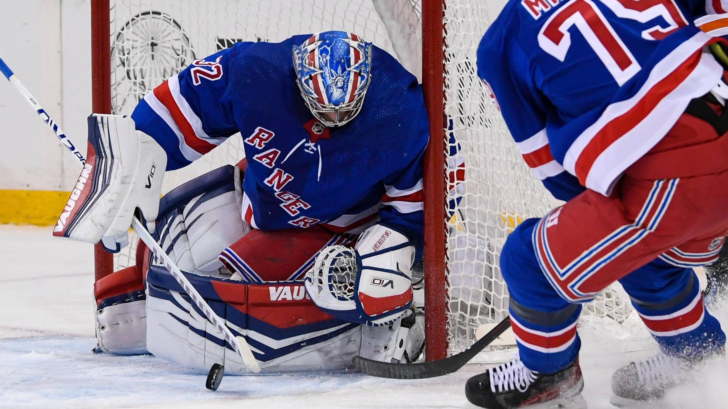 New York Rangers goaltender Jonathan Quick (32) makes a save against the Edmonton Oilers during the first period at Madison Square Garden / Dennis Schneidler - USA TODAY Sports