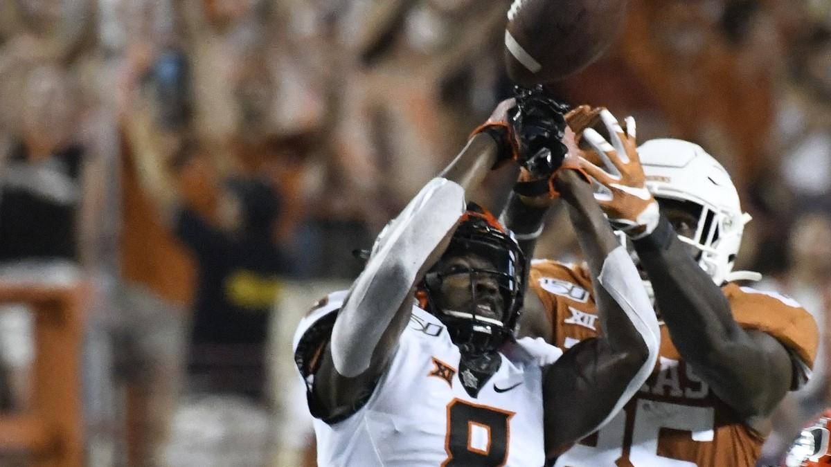Sep 21, 2019; Austin, TX, USA; Oklahoma State Cowboys defensive back Rodarius Williams (8) breaks up a pass intended for Texas Longhorns Malcolm Epps (85) in the second half at Darrell K Royal-Texas Memorial Stadium. / Scott Wachter-USA TODAY Sports