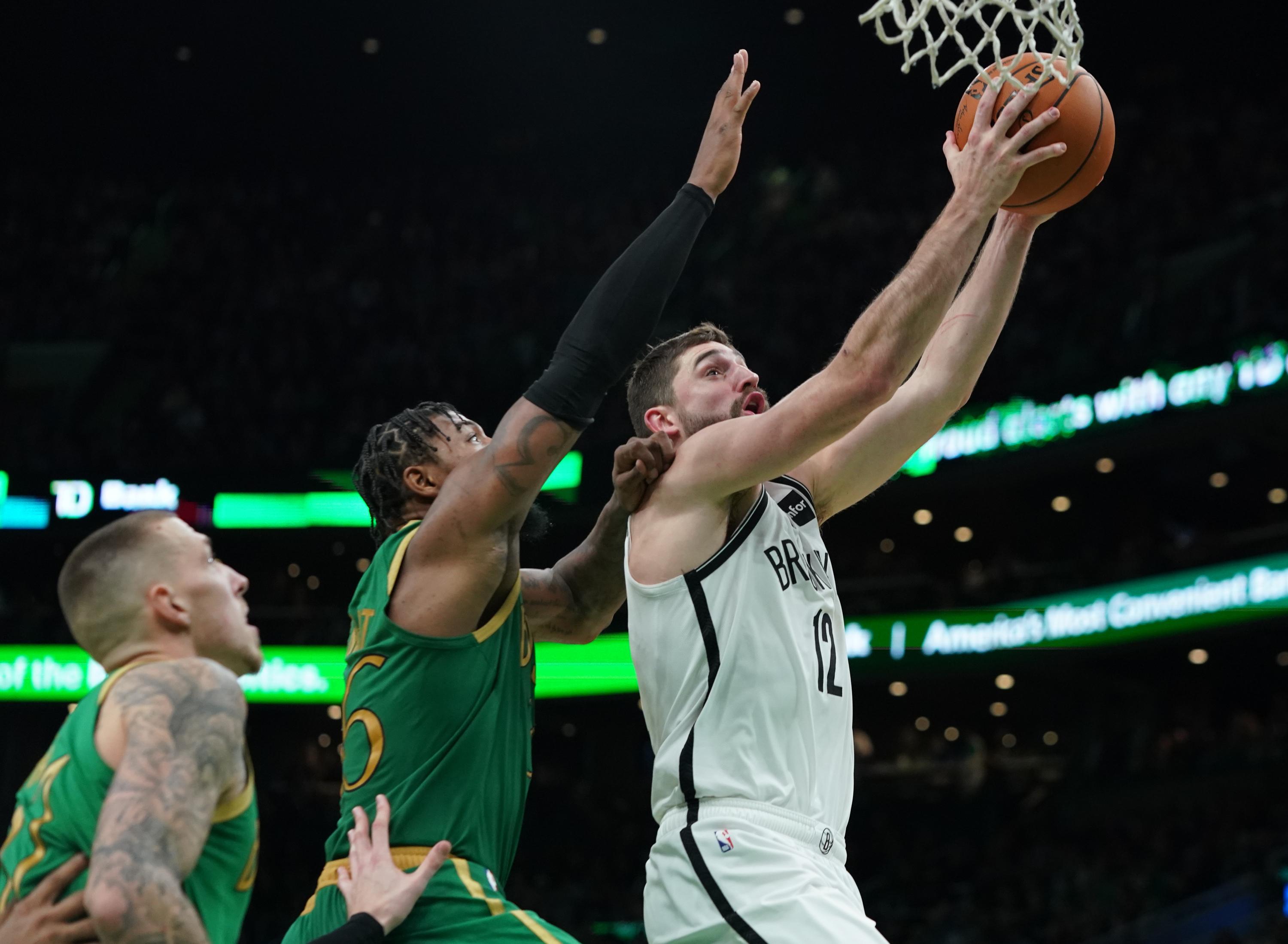 Nov 27, 2019; Boston, MA, USA; Brooklyn Nets guard Joe Harris (12) drives to the basket against Boston Celtics guard Marcus Smart (36) in the second half at TD Garden. Celtics defeated the Nets 121-110. Mandatory Credit: David Butler II-USA TODAY Sports / © David Butler II-USA TODAY Sports