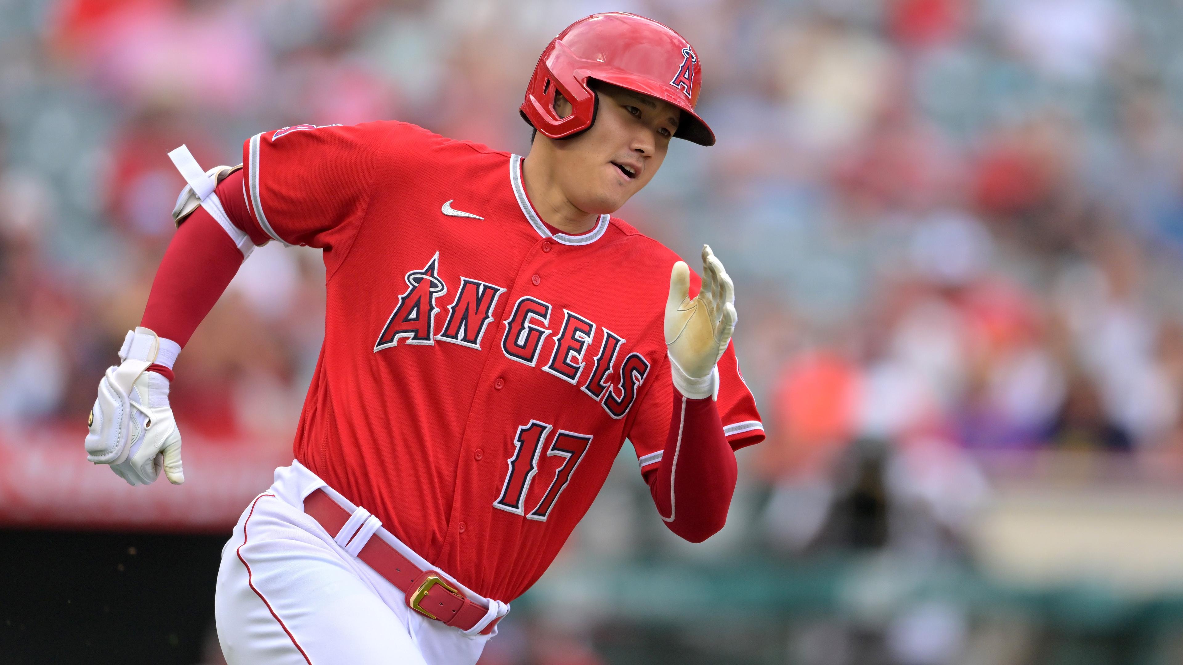 Los Angeles Angels designated hitter Shohei Ohtani (17) rounds the bases on a triple in the first inning against the Texas Rangers at Angel Stadium. / Jayne Kamin-Oncea-USA TODAY Sports