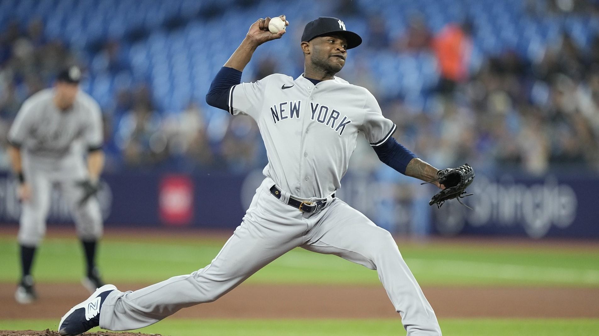 May 16, 2023; Toronto, Ontario, CAN; New York Yankees starting pitcher Domingo German (0) pitches to the Toronto Blue Jays during the first inning at Rogers Centre. / John E. Sokolowski-USA TODAY Sports
