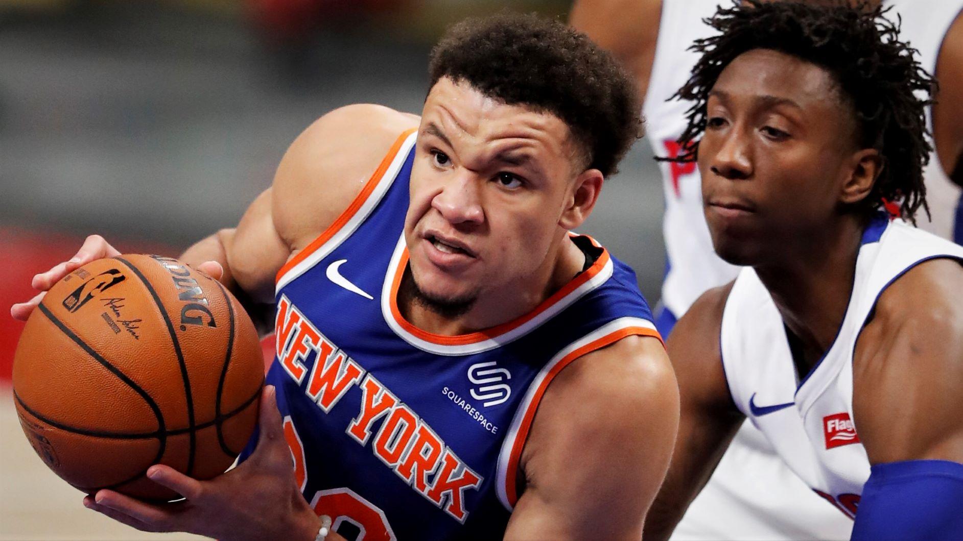 Dec 11, 2020; Detroit, Michigan, USA; New York Knicks forward Kevin Knox II (20) drives to the basket against Detroit Pistons guard Saben Lee (38) during the fourth quarter at Little Caesars Arena. Mandatory Credit: Raj Mehta-USA TODAY Sports / © Raj Mehta-USA TODAY Sports