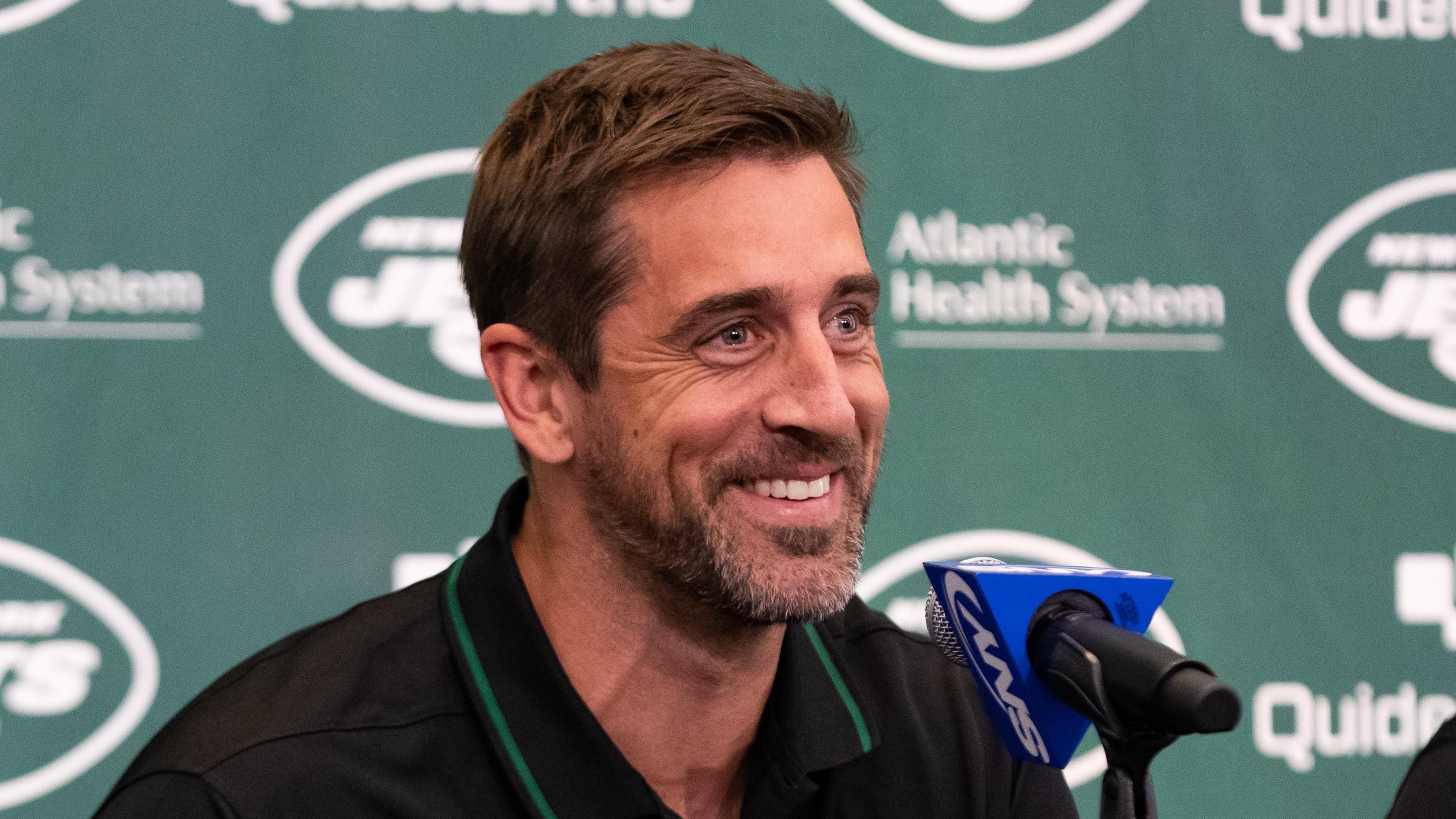 Apr 26, 2023; Florham Park, NJ, USA; New York Jets quarterback Aaron Rodgers (8) talks to the media during the introductory press conference at Atlantic Health Jets Training Center. / Tom Horak-USA TODAY Sports
