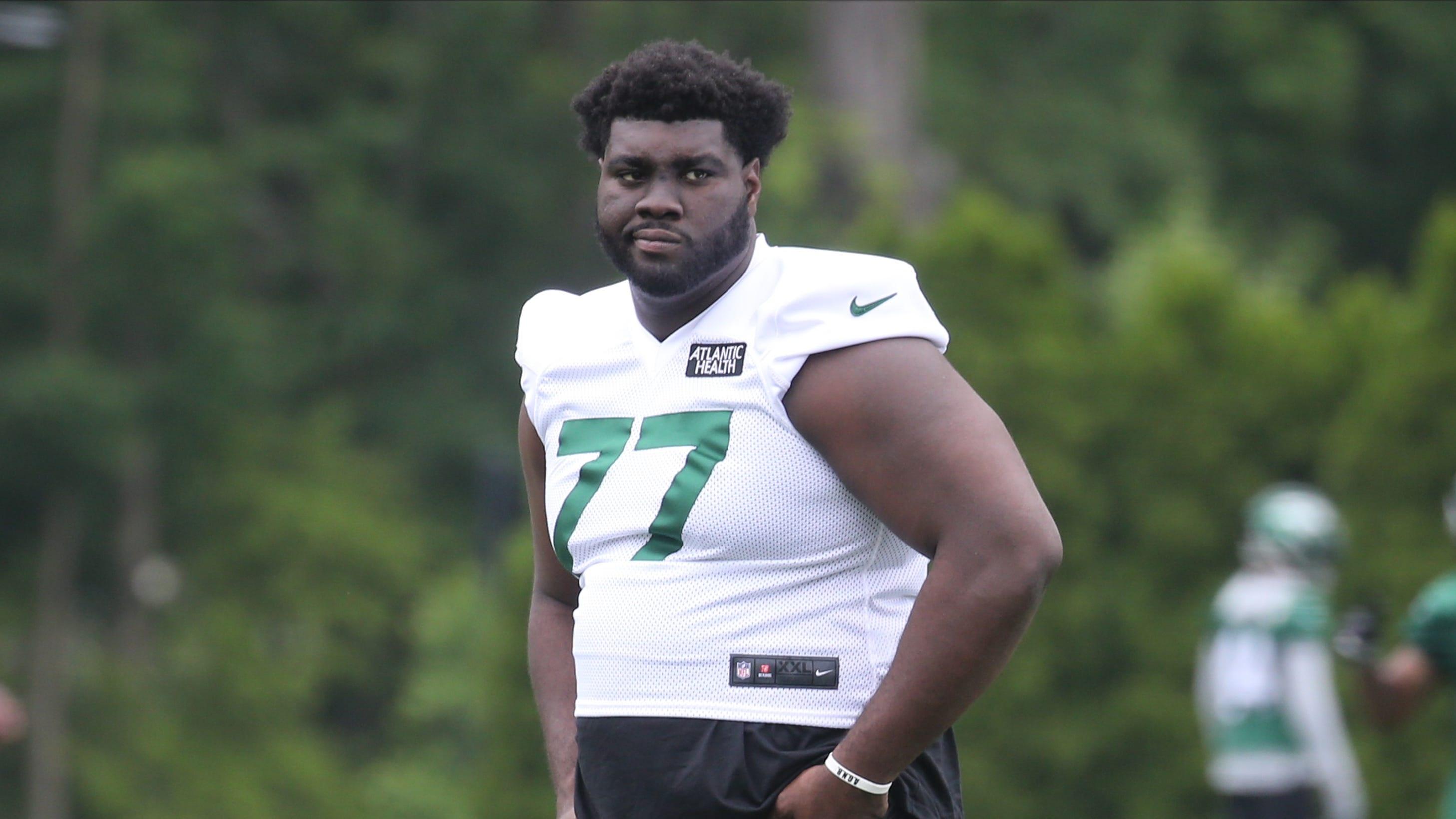 Sidelined offensive lineman Mekhi Becton watching practice as the New York Jets held OTA's this morning at their practice facility in Florham Park, NJ on June 4, 2021. The New York Jets Held Ota S This Morning At Their Practice Facility In Florham Park Nj On June 4 2021 / © Chris Pedota, NorthJersey.com via Imagn Content Services, LLC