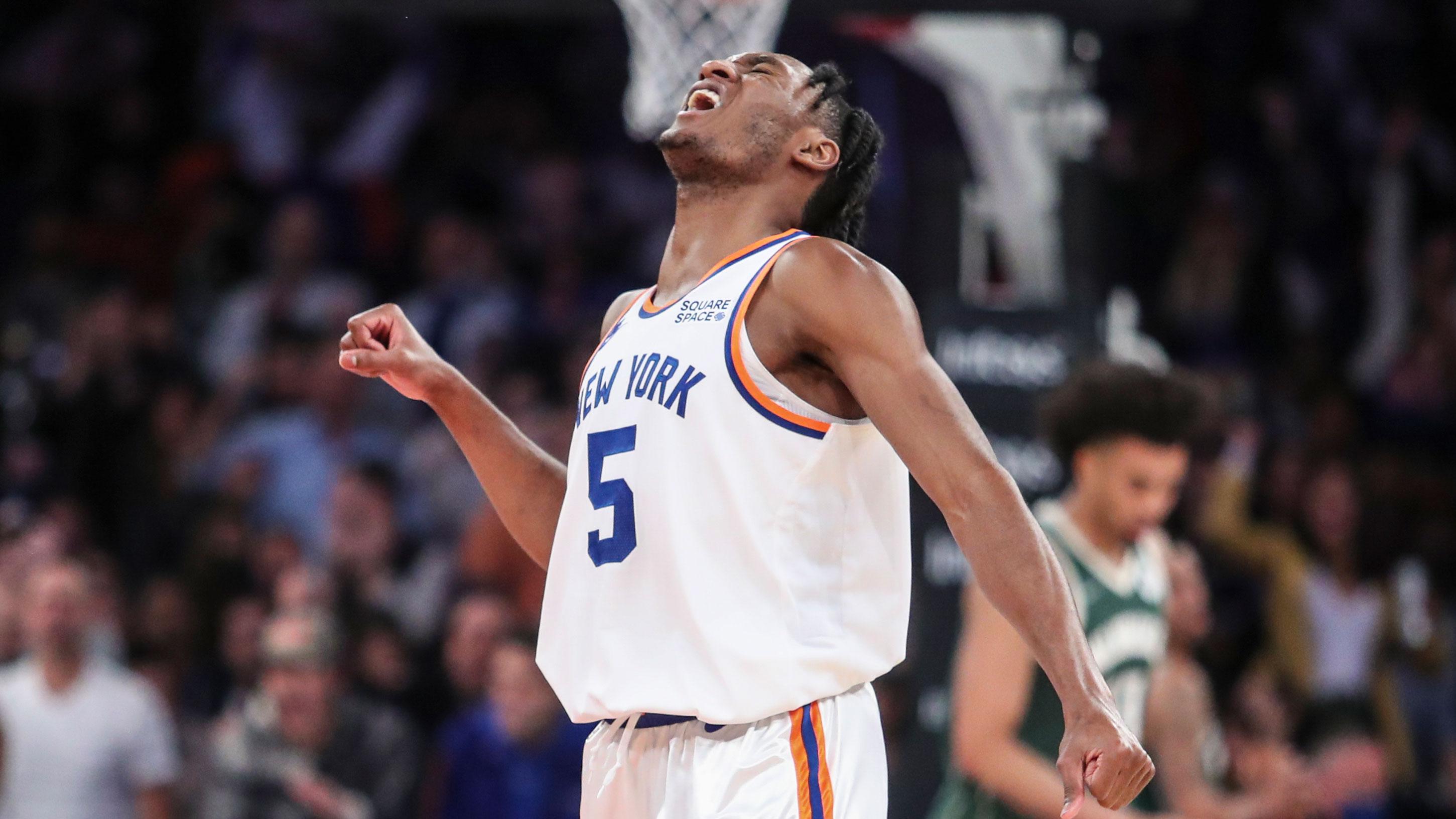 Nov 10, 2021; New York, New York, USA; New York Knicks guard Immanuel Quickley (5) celebrates during a timeout in the second quarter against the Milwaukee Bucks at Madison Square Garden. / Wendell Cruz-USA TODAY Sports