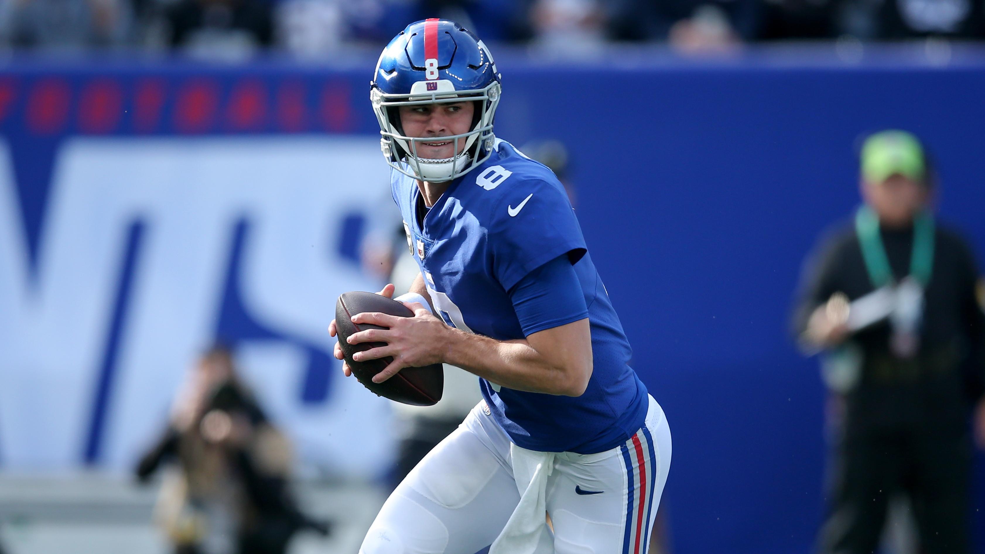 Nov 7, 2021; East Rutherford, New Jersey, USA; New York Giants quarterback Daniel Jones (8) rolls out of the pocket to pass against the Las Vegas Raiders during the first quarter at MetLife Stadium. Mandatory Credit: Brad Penner-USA TODAY Sports / © Brad Penner-USA TODAY Sports