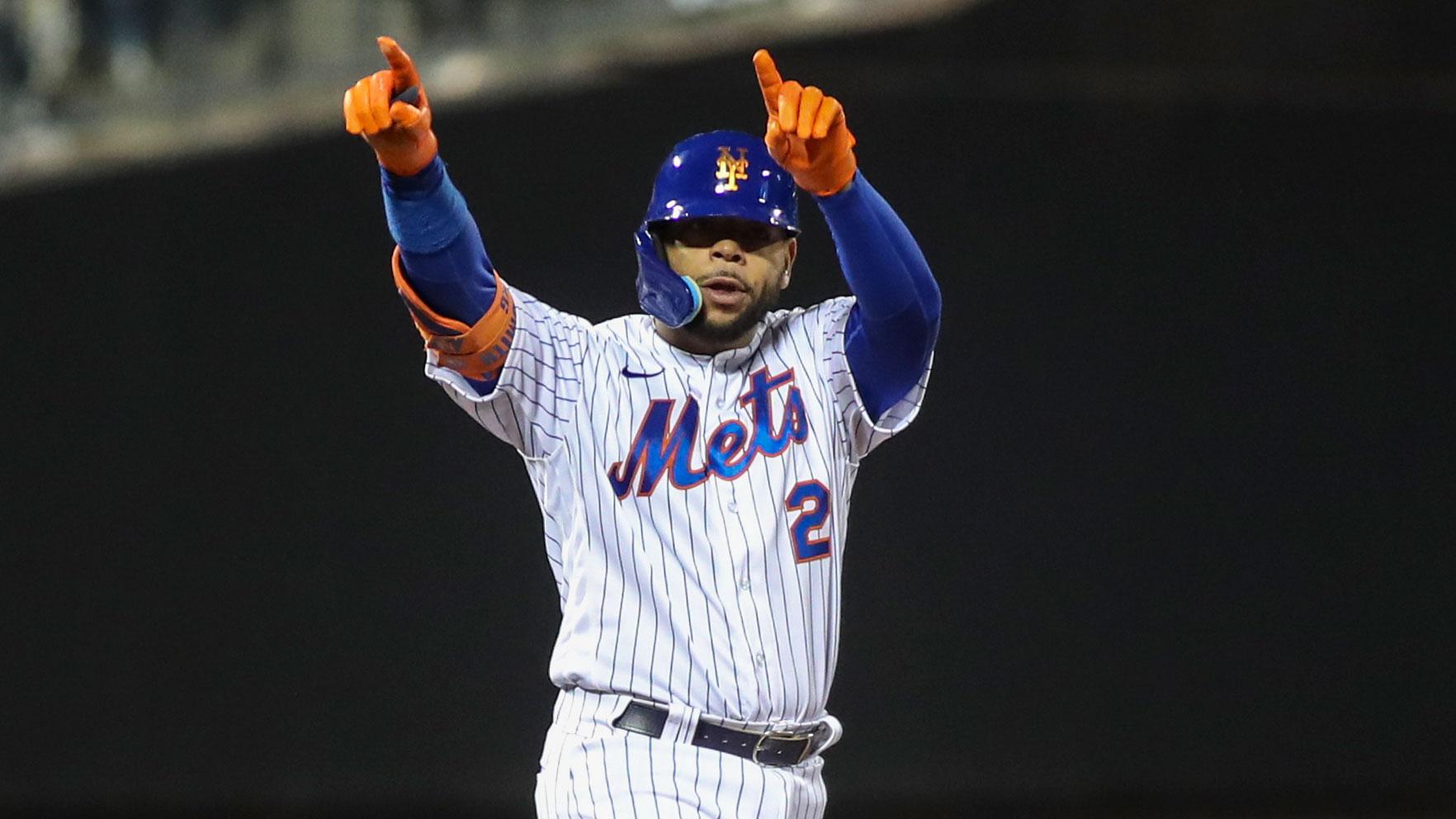May 1, 2022; New York City, New York, USA; New York Mets first baseman Dominic Smith (2) points to the dugout after hitting an RBI double in the fourth inning against the Philadelphia Phillies at Citi Field. Mandatory Credit: Wendell Cruz-USA TODAY Sports / © Wendell Cruz-USA TODAY Sports