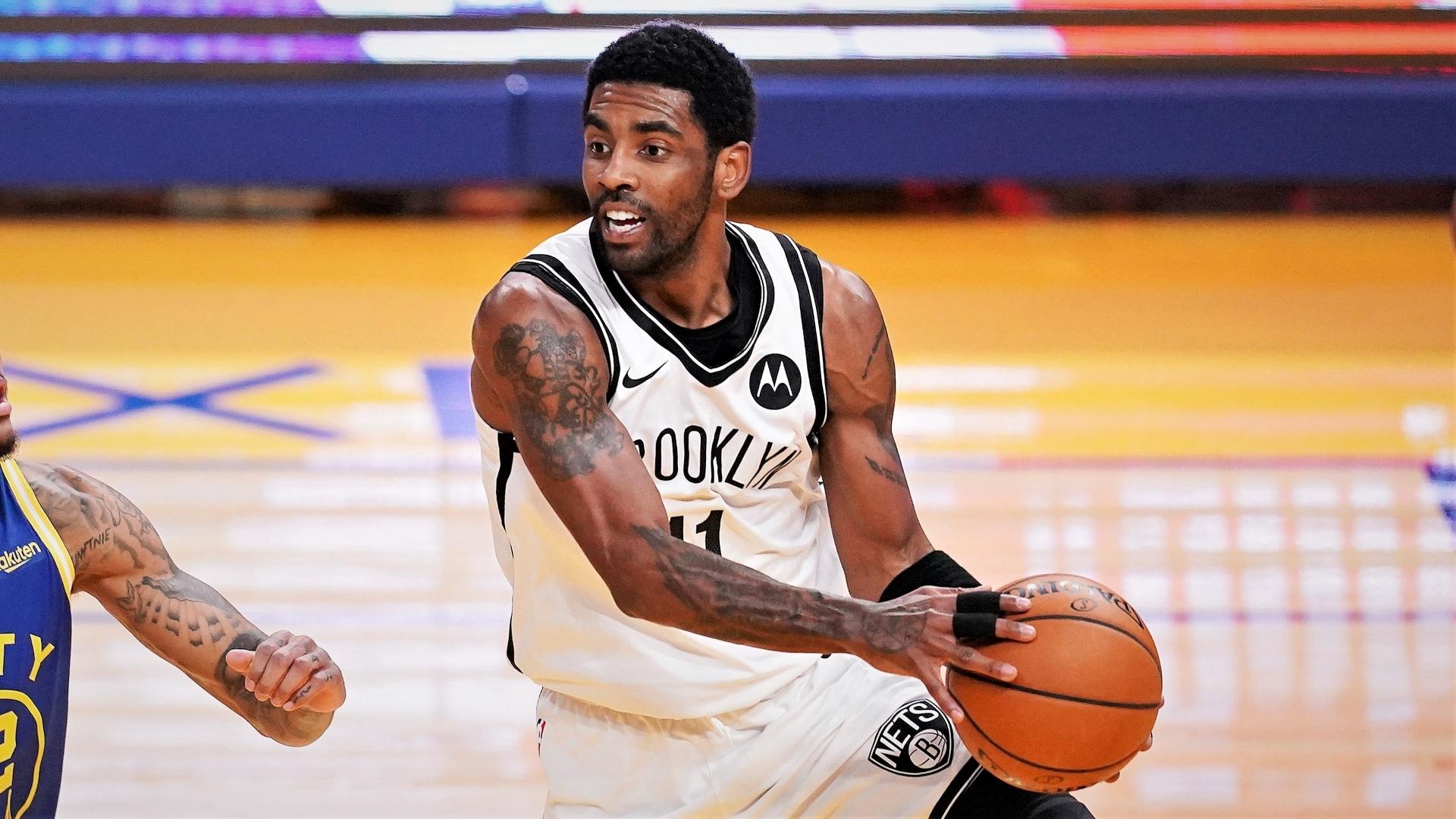 Feb 13, 2021; San Francisco, California, USA; Brooklyn Nets guard Kyrie Irving (11) looks to pass the ball against the Golden State Warriors in the first quarter at the Chase Center. / Cary Edmondson-USA TODAY Sports
