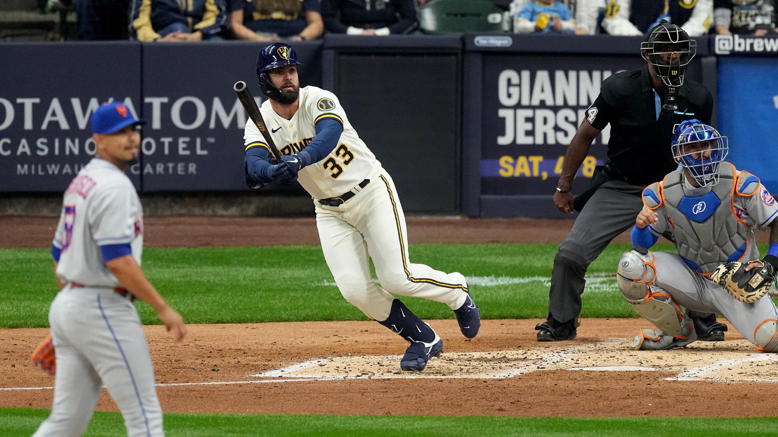 Milwaukee Brewers left fielder Jesse Winker (33) hits an RBI single during the third inning of their game against the New York Mets Monday, April 3, 2023 at American Family Field in Milwaukee, Wis / © MARK HOFFMAN/MILWAUKEE JOURNAL SENTINEL / USA TODAY NETWORK