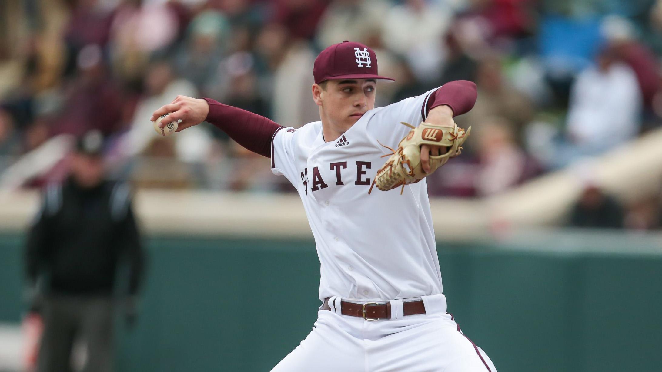 J.T. Ginn in white Miss State jersey throwing a pitch / Keith Warren/USA TODAY