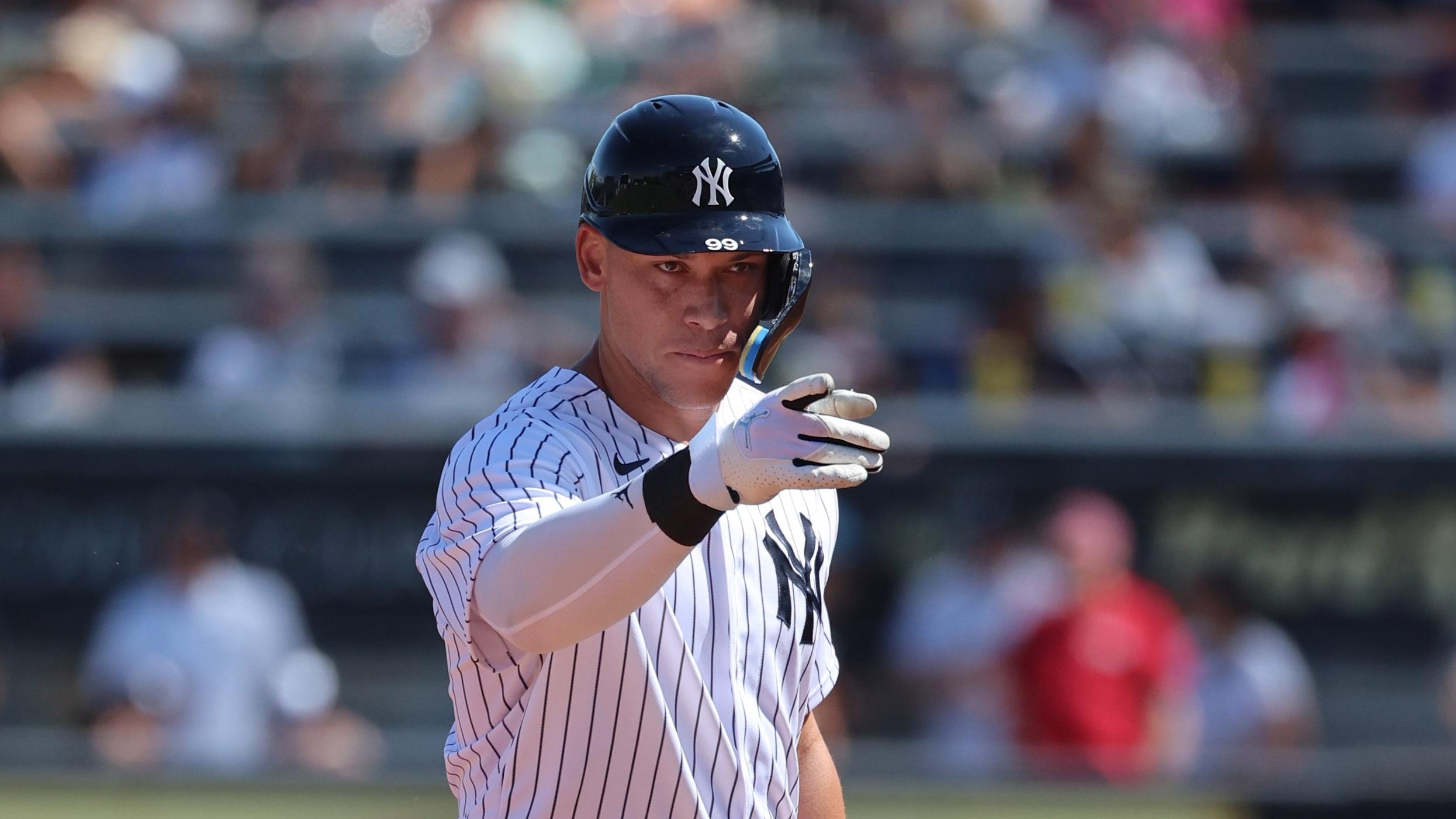 Feb 26, 2023; Tampa, Florida, USA; New York Yankees center fielder Aaron Judge (99) points during the first inning against the Atlanta Braves at George M. Steinbrenner Field. Mandatory Credit: Kim Klement-USA TODAY Sports / © Kim Klement-USA TODAY Sports