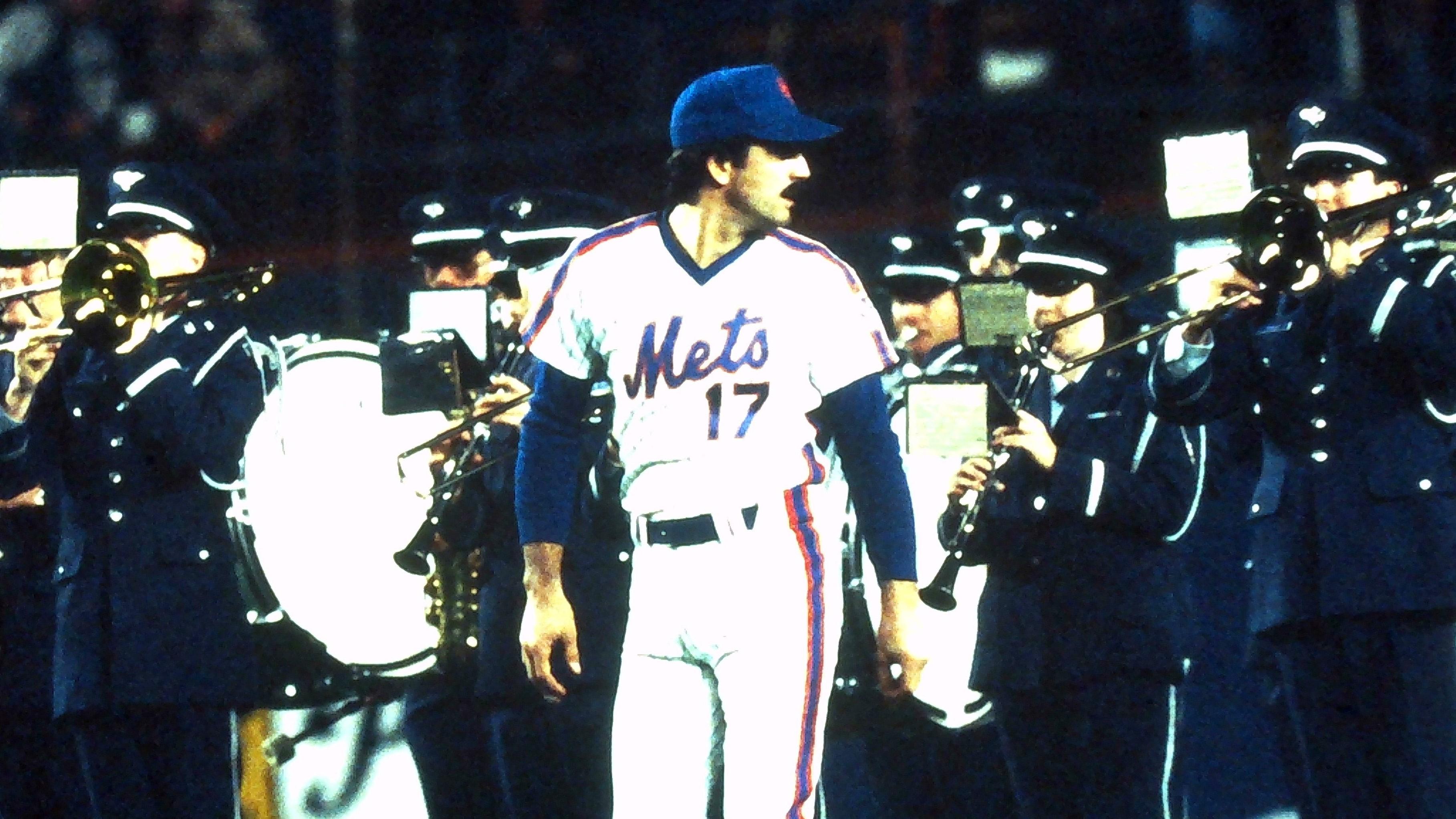 Keith Hernandez walks by the band playing in the outfield prior to Game 6 against the Red Sox in 1986 World Series. / Frank Becerra Jr/USA TODAY / USA TODAY NETWORK