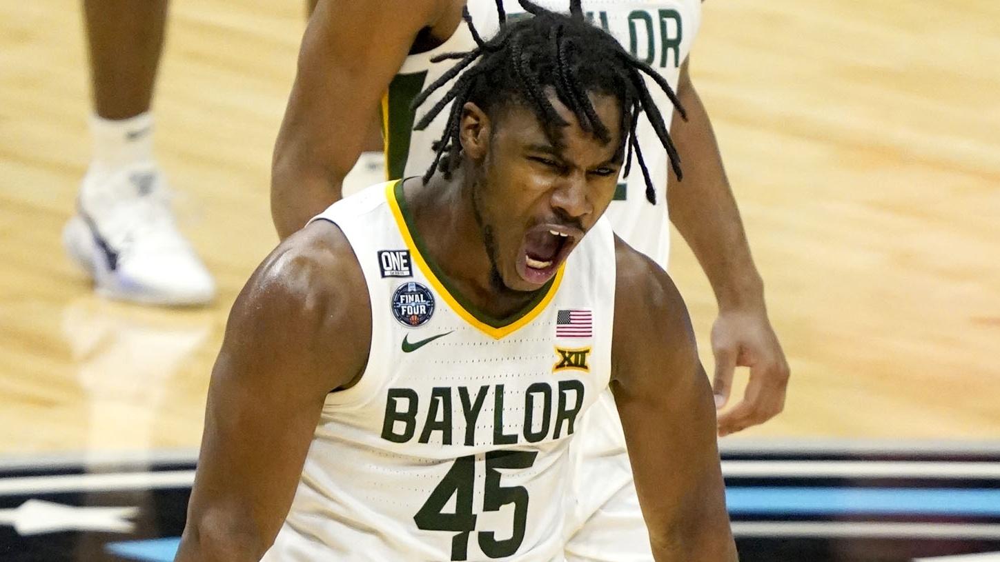 Baylor Bears guard Davion Mitchell (45) celebrates after sinking a buzzer beater three-pointer at the end of the first half against Houston during the semifinals of the Final Four of the 2021 NCAA Tournament on Saturday, April 3, 2021, at Lucas Oil Stadium in Indianapolis, Ind. / © IndyStar-USA TODAY Sports