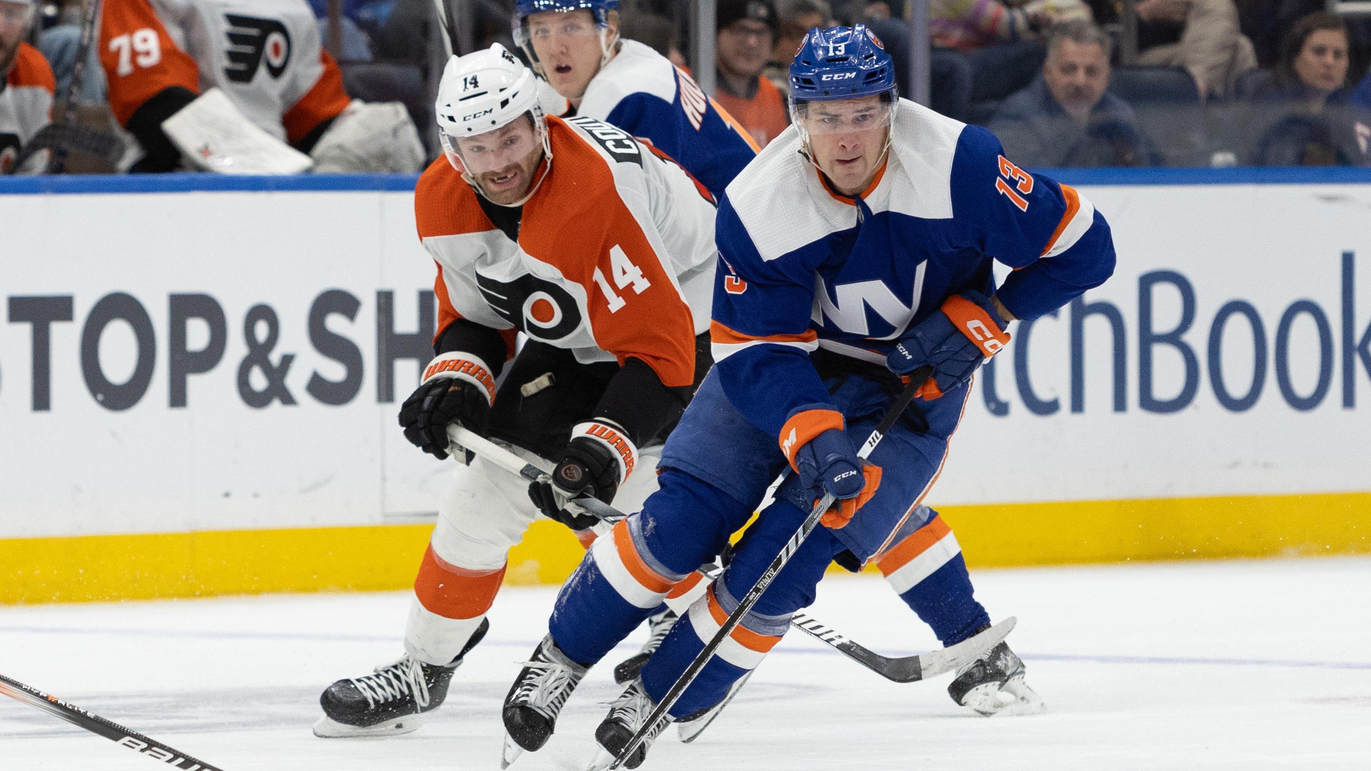 New York Islanders center Mathew Barzal (13) skates with the puck against the Philadelphia Flyers during the second period at UBS Arena. / Thomas Salus-USA TODAY Sports