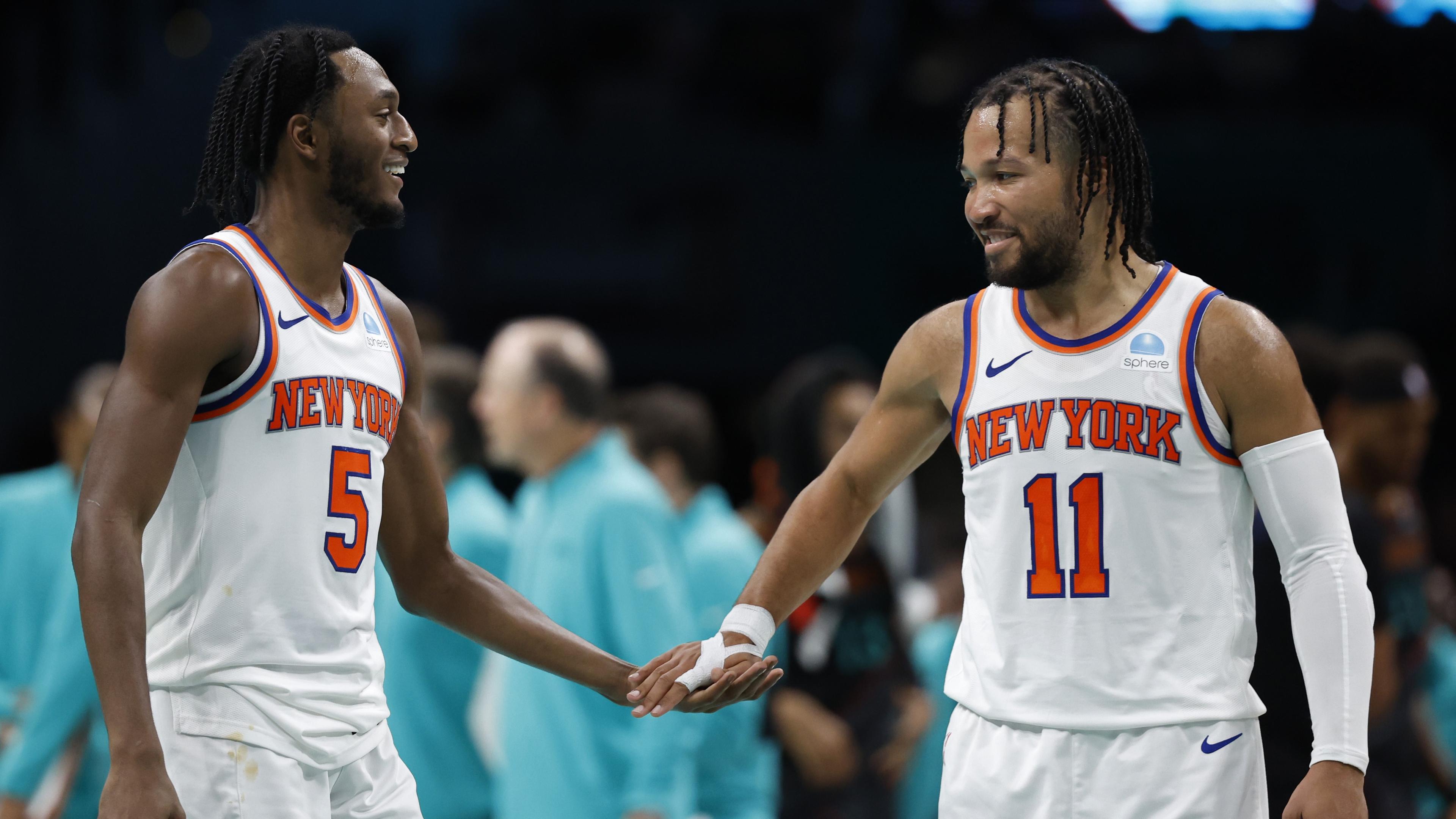 Nov 17, 2023; Washington, District of Columbia, USA; New York Knicks guard Immanuel Quickley (5) celebrates with Knicks guard Jalen Brunson (11) against the Washington Wizards in the fourth quarter at Capital One Arena. Mandatory Credit: Geoff Burke-USA TODAY Sports / © Geoff Burke-USA TODAY Sports