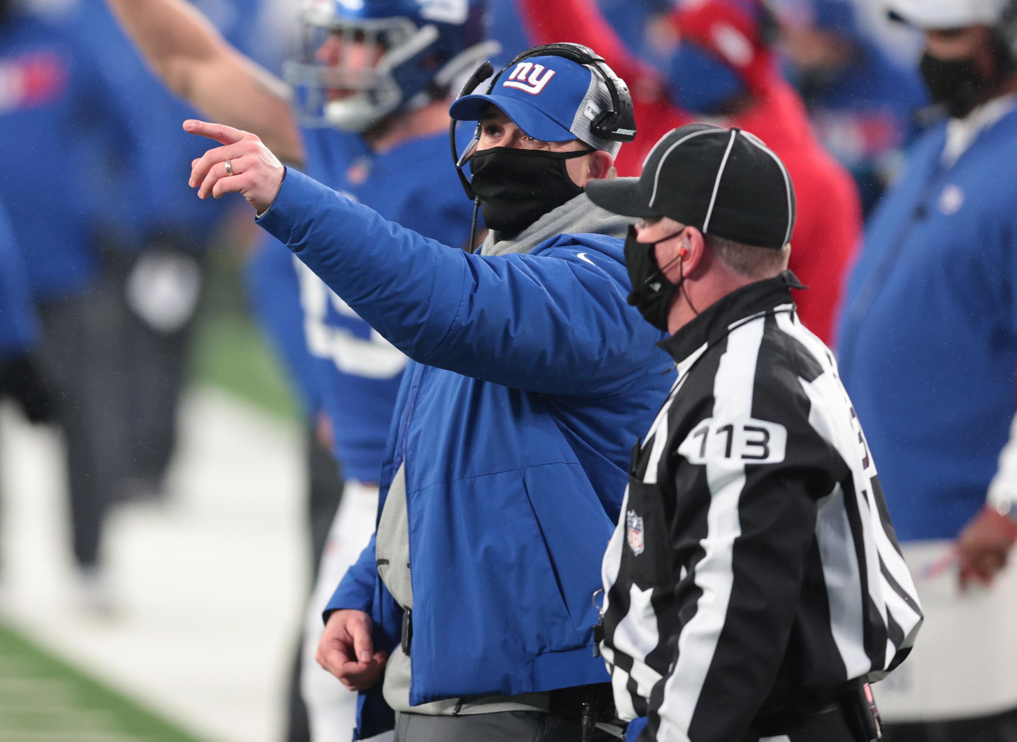 Jan 3, 2021; East Rutherford, NJ, USA; New York Giants head coach Joe Judge talks with an official against the Dallas Cowboys in the second half at MetLife Stadium. Mandatory Credit: Vincent Carchietta-USA TODAY Sports / © Vincent Carchietta-USA TODAY Sports
