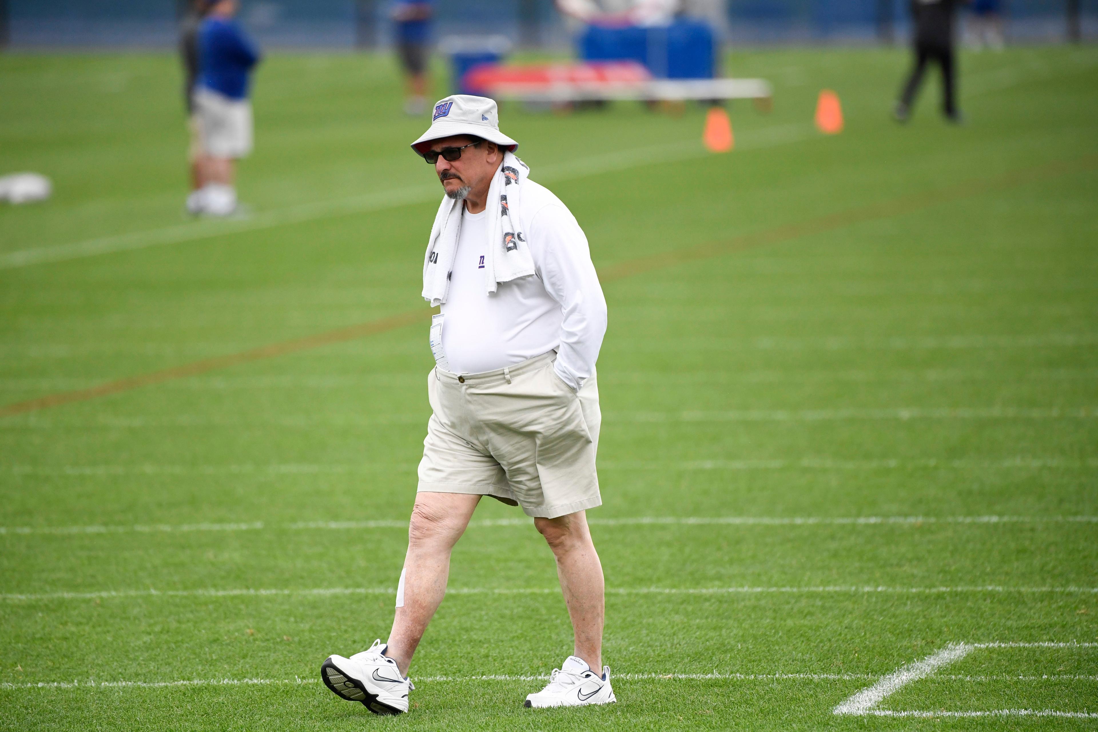 June 5, 2019; East Rutherford, NJ, USA; New York Giants general manager Dave Gettleman walks the field during minicamp. Mandatory Credit: Danielle Parhizkaran/NorthJersey.com via USA TODAY NETWORK / © NorthJersey.com-USA TODAY NETWORK