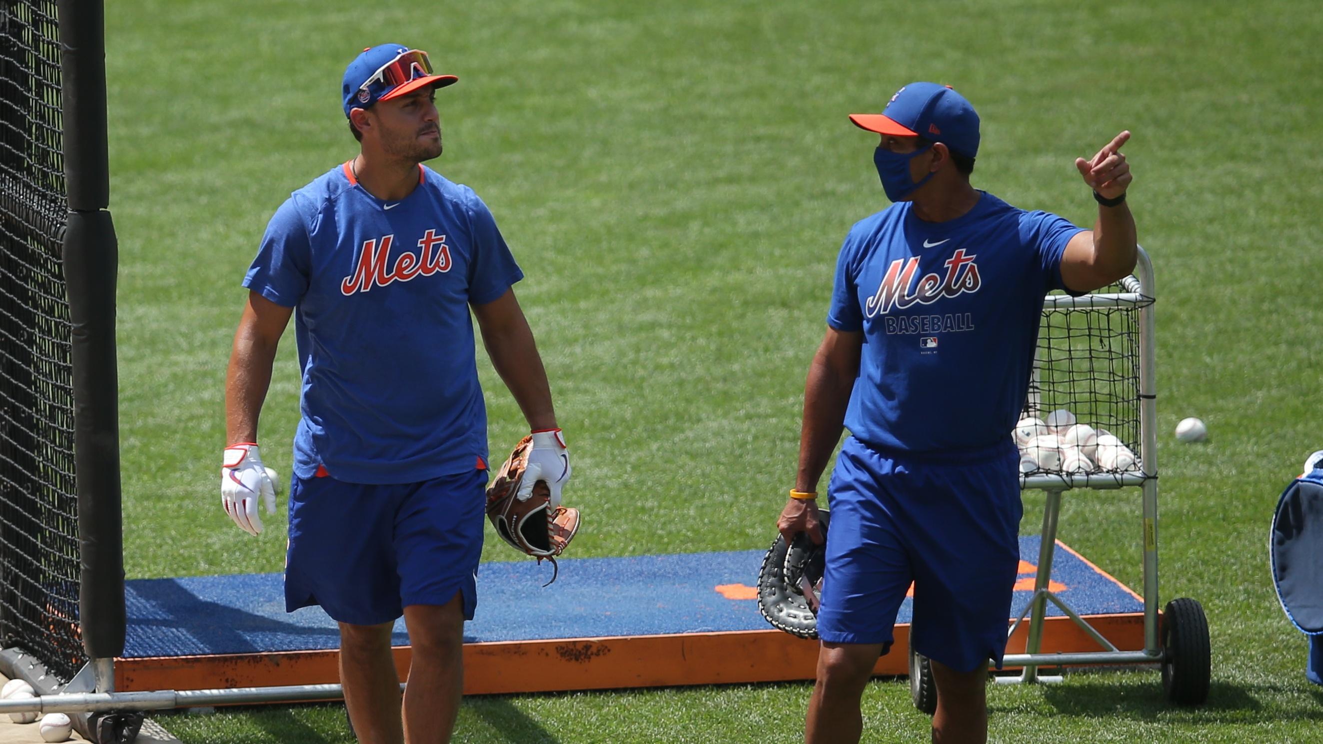 Jul 12, 2020; Flushing Meadows, New York, United States; New York Mets right fielder Michael Conforto (left) talks to manager Luis Rojas during summer camp workouts at Citi Field. Mandatory Credit: Brad Penner-USA TODAY Sports / © Brad Penner-USA TODAY Sports