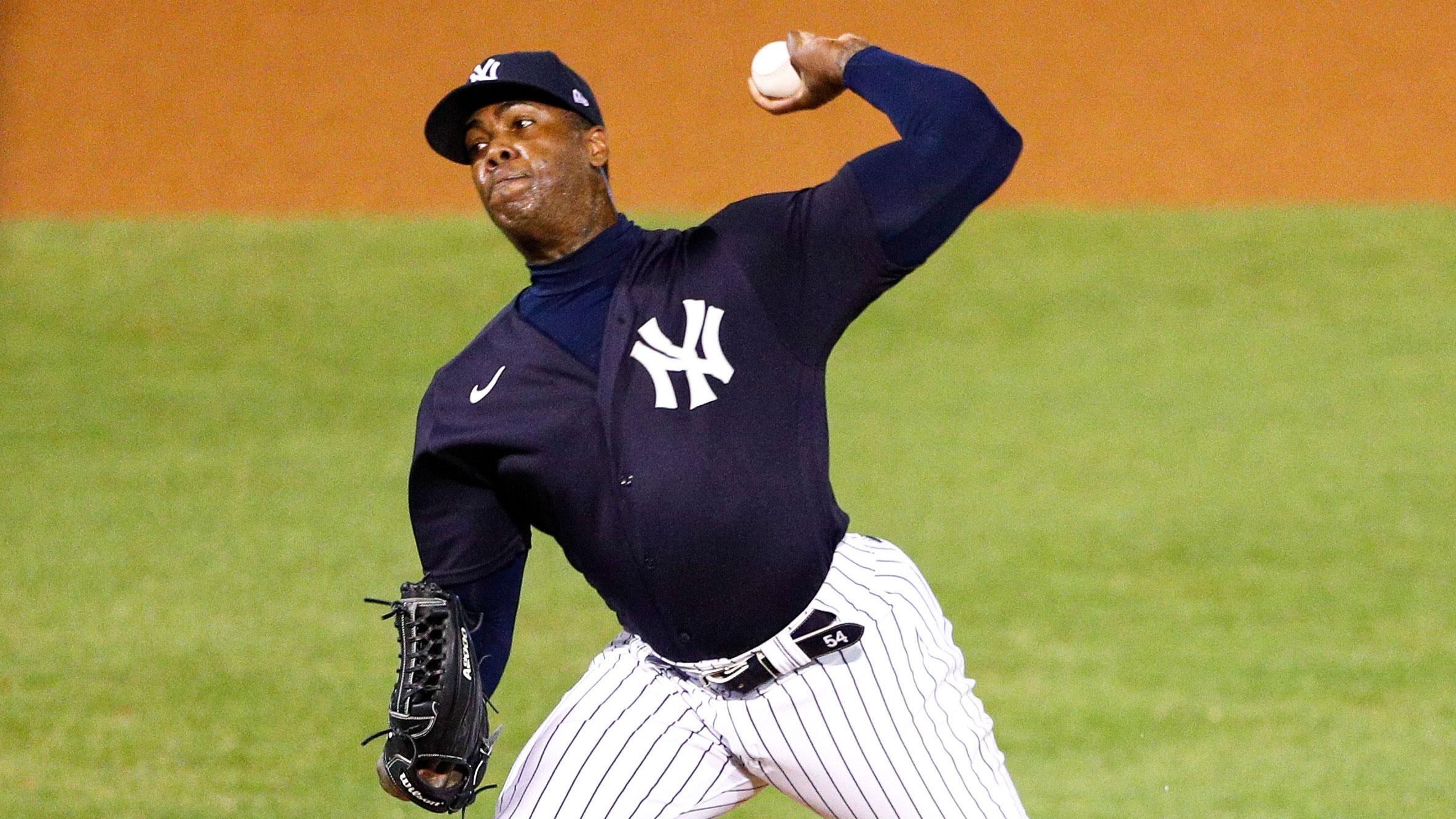 Mar 26, 2021; Tampa, Florida, USA; New York Yankees relief pitcher Aroldis Chapman (54) pitches in the sixth inning against the Baltimore Orioles during spring training at George M. Steinbrenner Field. / Nathan Ray Seebeck-USA TODAY Sports