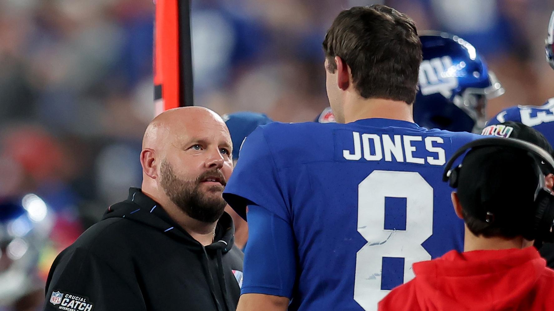Oct 2, 2023; East Rutherford, New Jersey, USA; New York Giants head coach Brian Daboll talks to quarterback Daniel Jones (8) during the second quarter against the Seattle Seahawks at MetLife Stadium. Mandatory Credit: Brad Penner-USA TODAY Sports / © Brad Penner-USA TODAY Sports