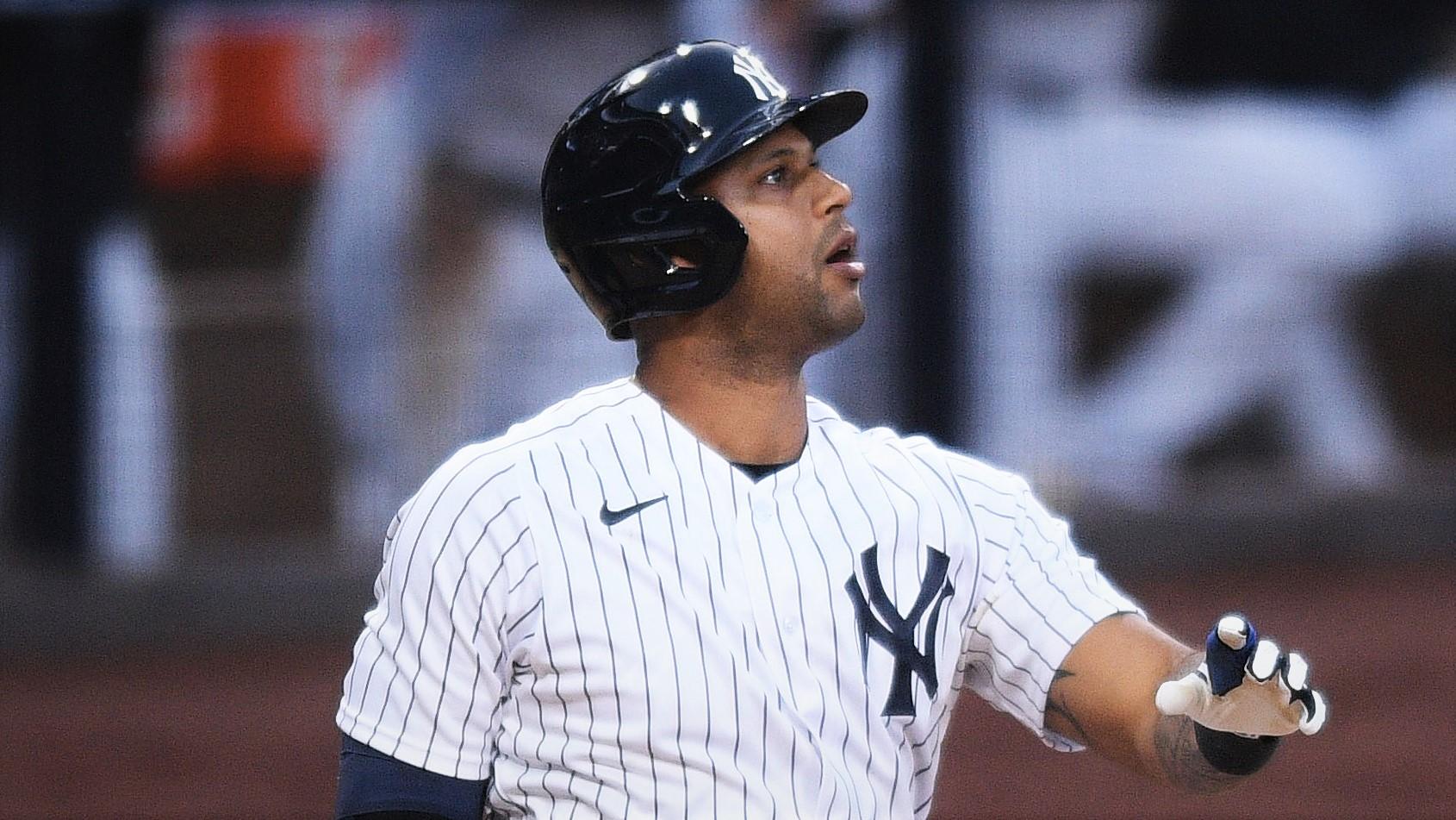 Oct 7, 2020; San Diego, California, USA; New York Yankees center fielder Aaron Hicks (31) hits an RBI double against the Tampa Bay Rays in the fifth inning during game three of the 2020 ALDS at Petco Park. Mandatory Credit: Orlando Ramirez-USA TODAY Sports / © Orlando Ramirez-USA TODAY Sports